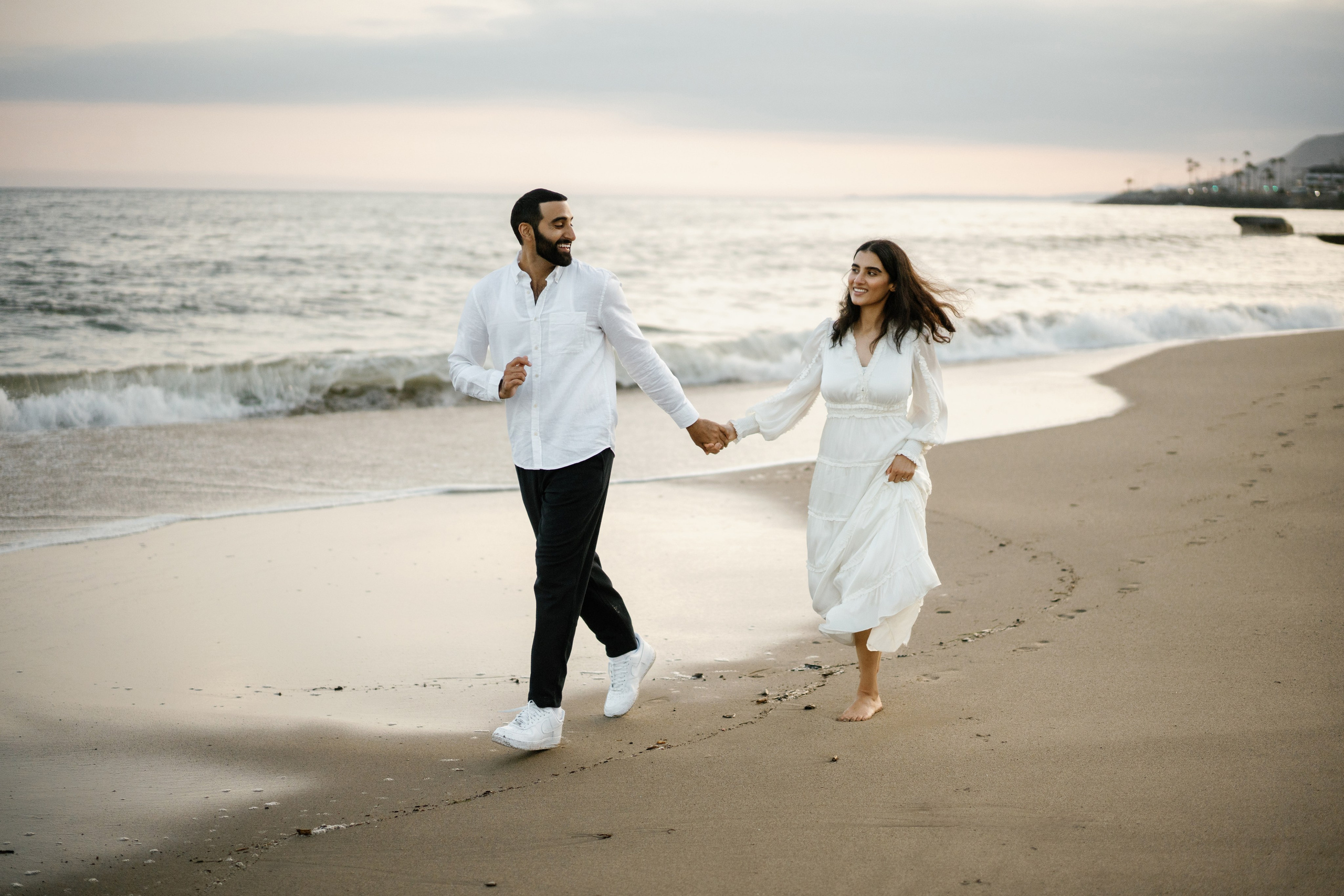 Santa Monica Sunset Engagement Photoshoot. Wedding Photography & Videography Team in California, Los Angeles, San Francisco, San Diego and Travel