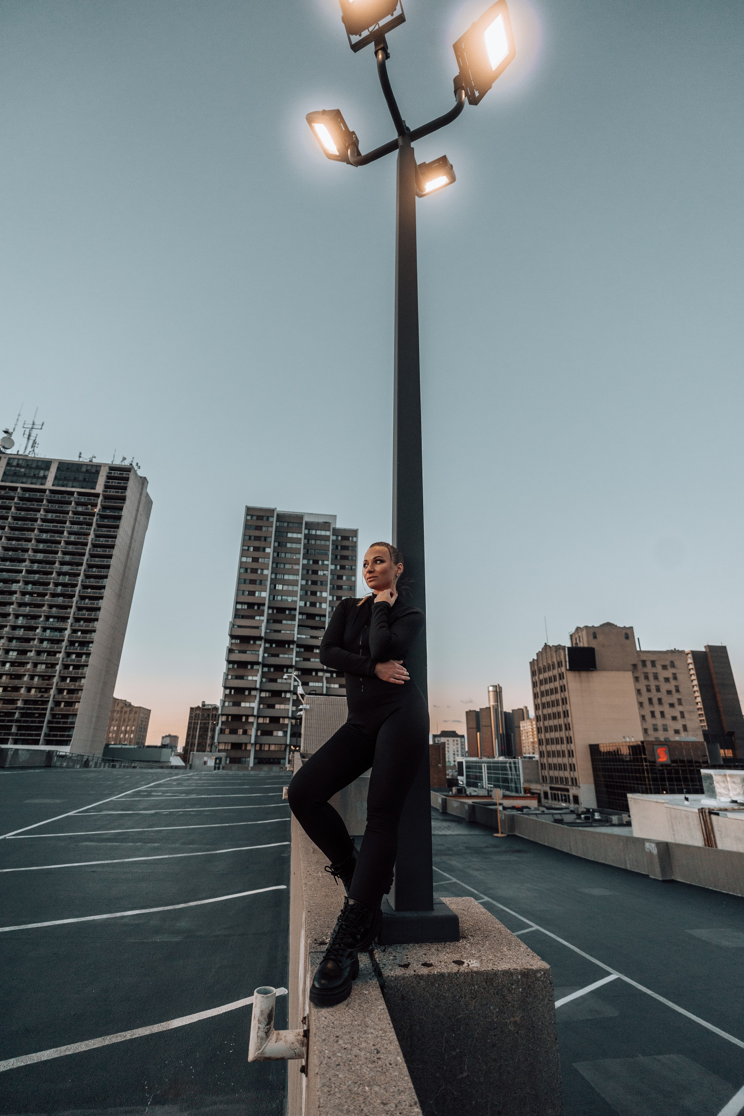 Portrait photography in Windsor, Ontario, with a rooftop photoshoot that highlights your individuality and creativity.