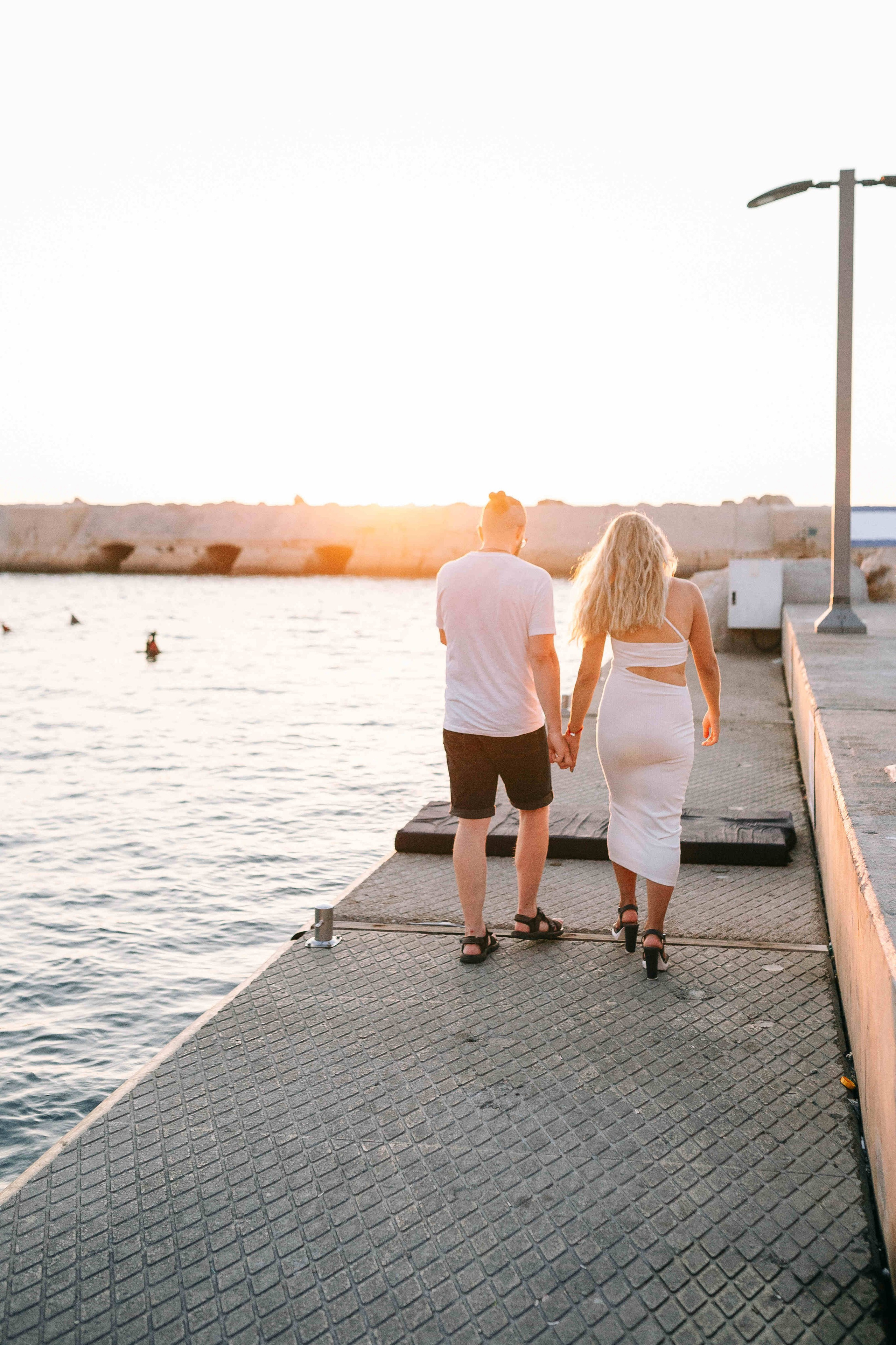 SUNSET IN JAFFO PORT. PHOTOGRAPHER IN ISRAEL