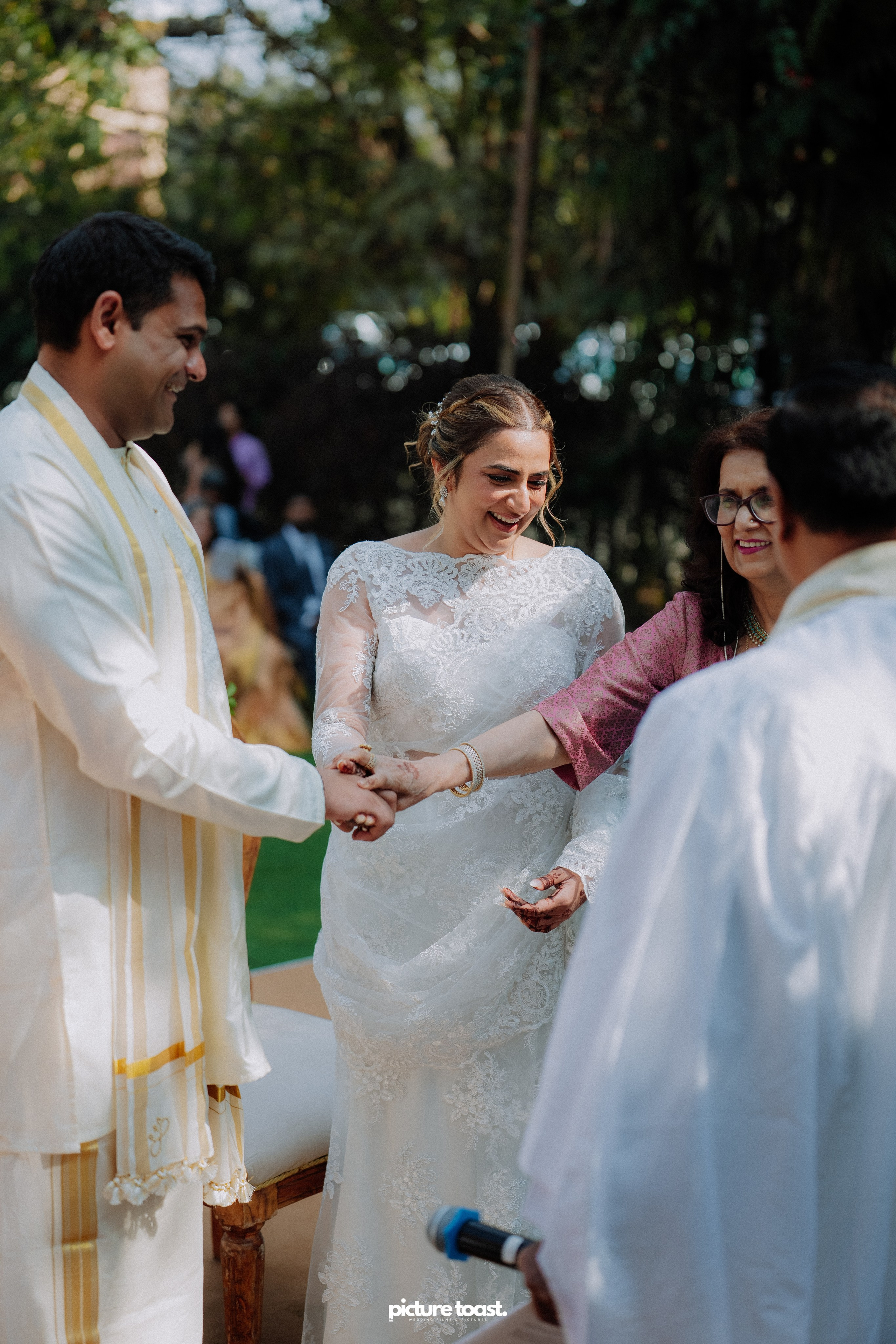 Blessing of Rajiv & Aashna. Fine art Wedding Photographers in India & Canada