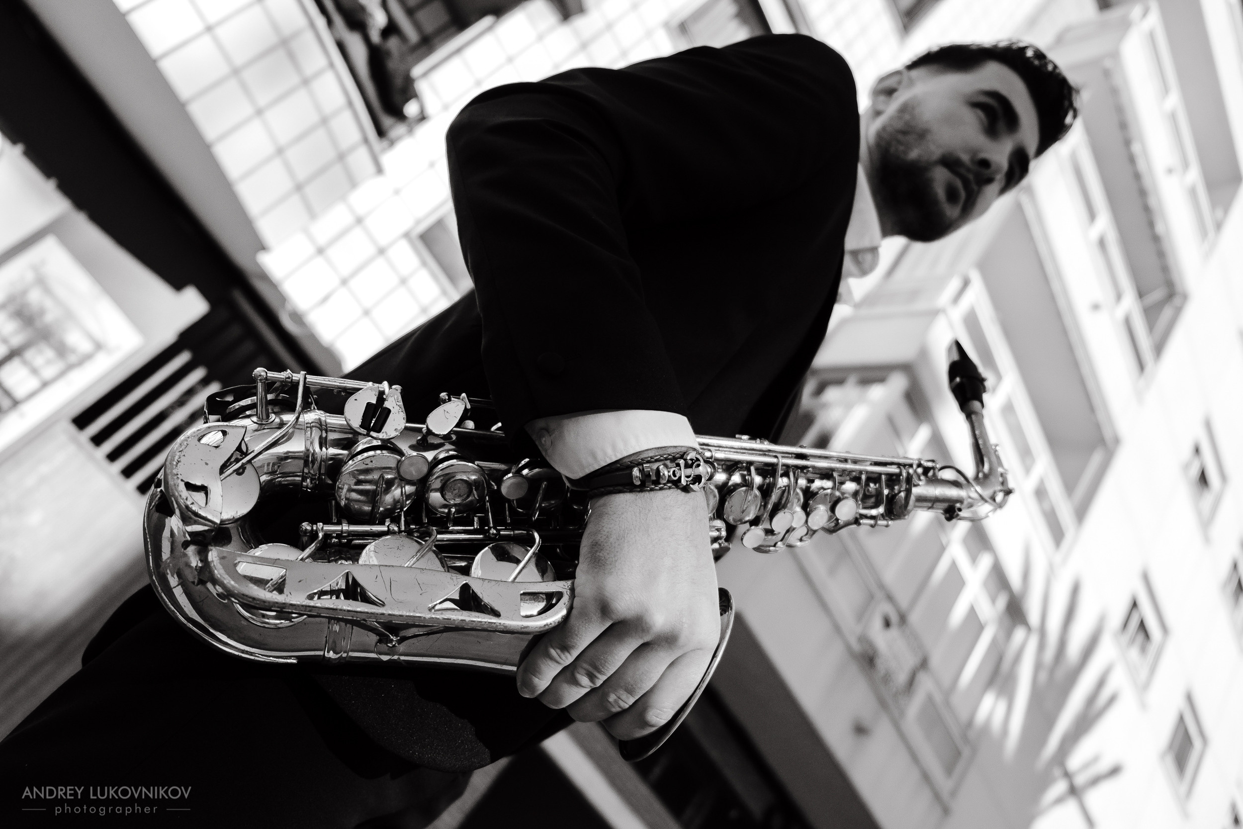 Saxophonist Pavel Leontiev. Photo session for a musician in the city