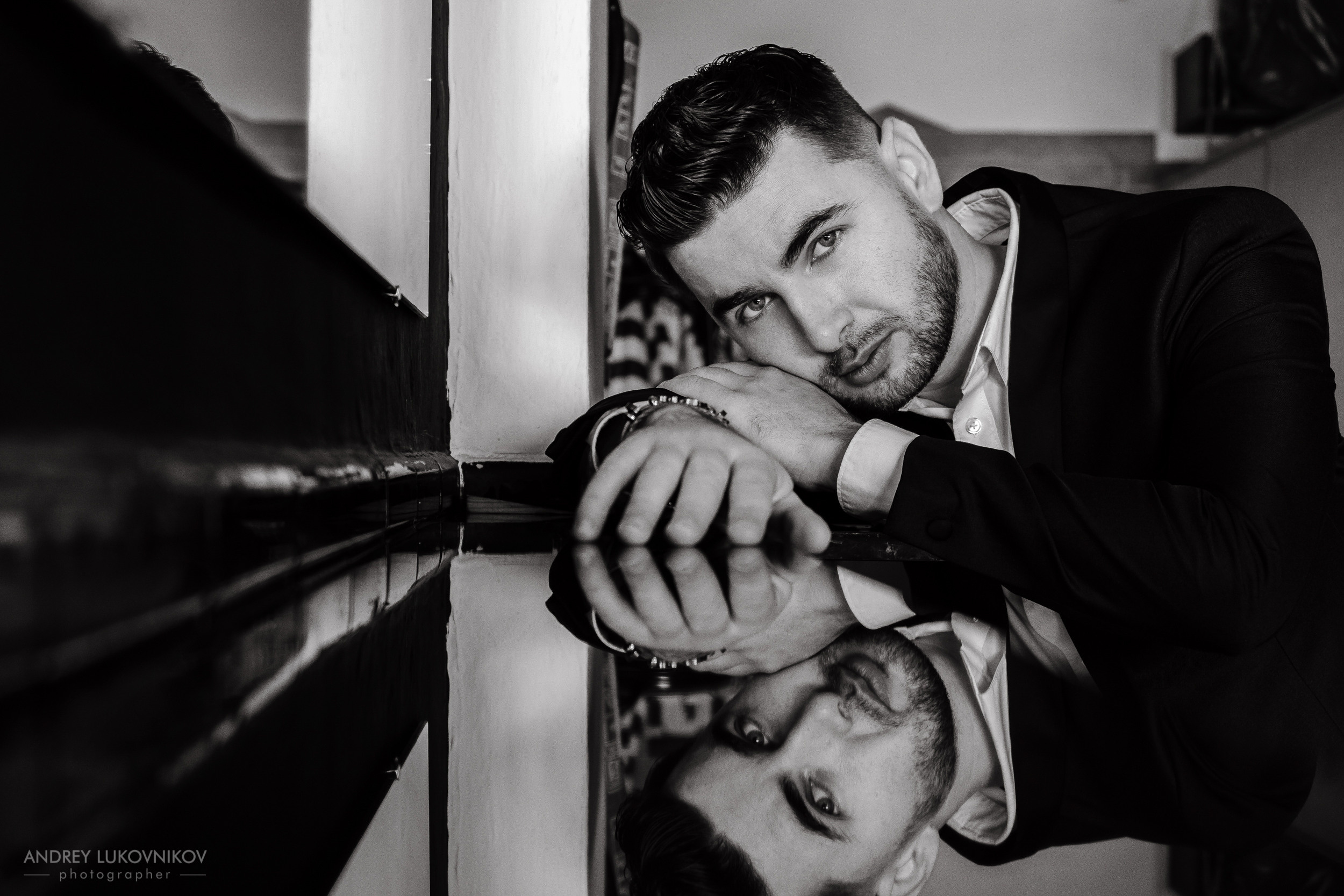 Saxophonist Pavel Leontiev. Photo session for a musician in the city