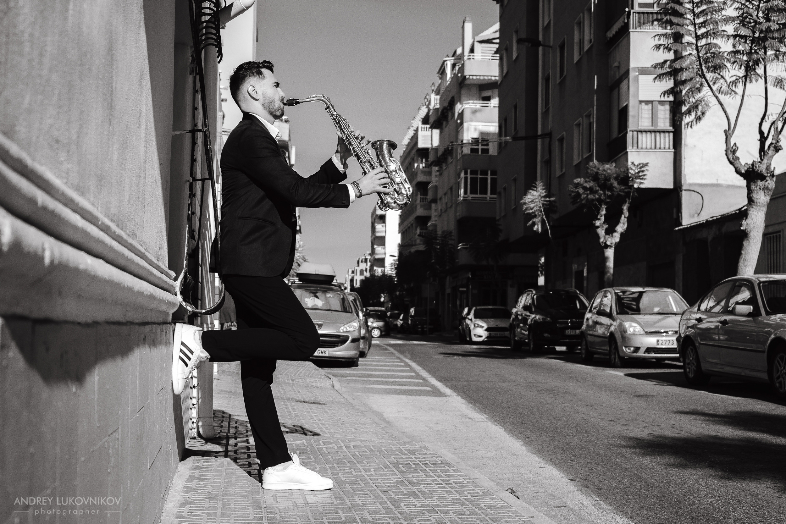 Saxophonist Pavel Leontiev. Photo session for a musician in the city