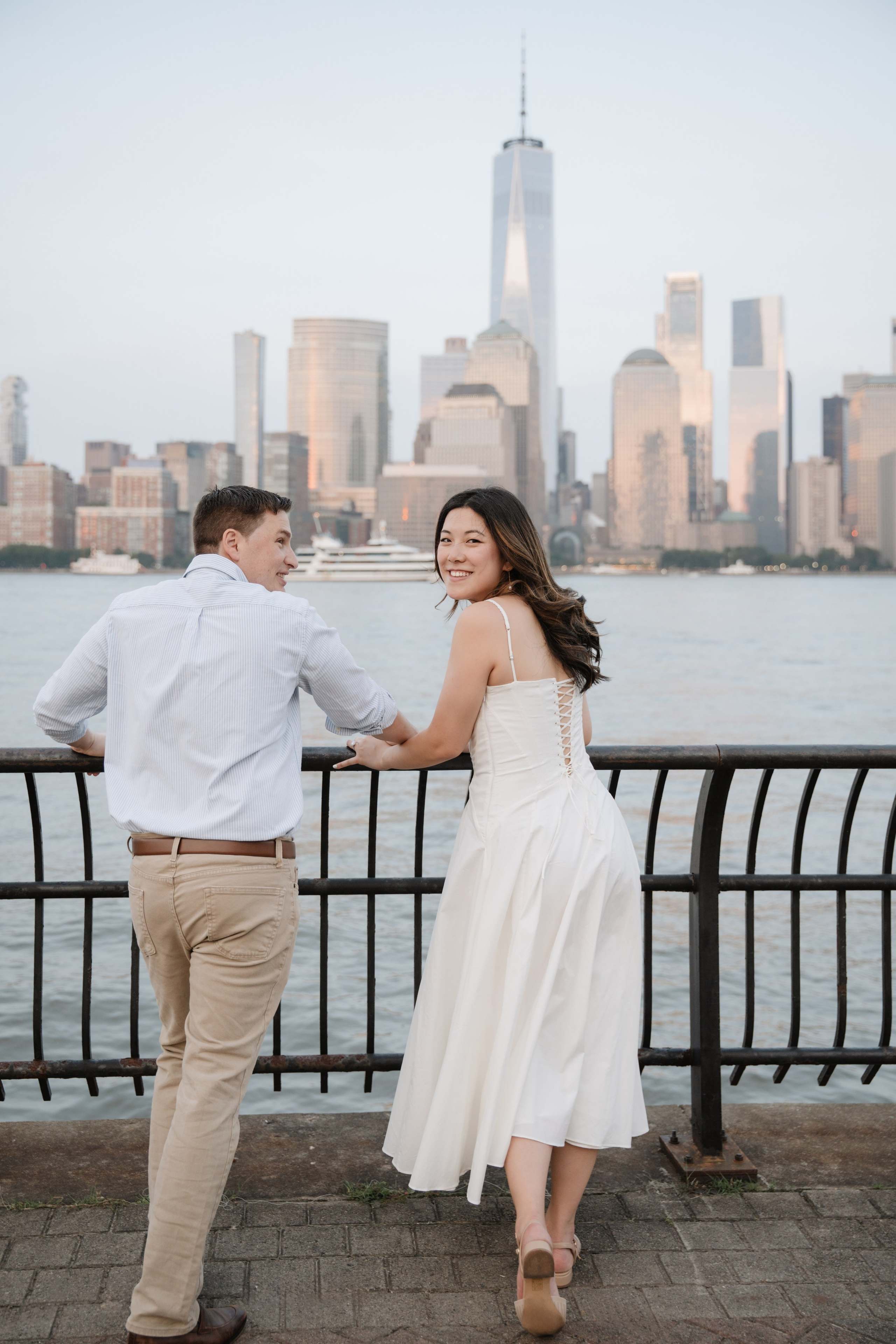 An adorable couple with their dog. Portrait and wedding photographer in New York