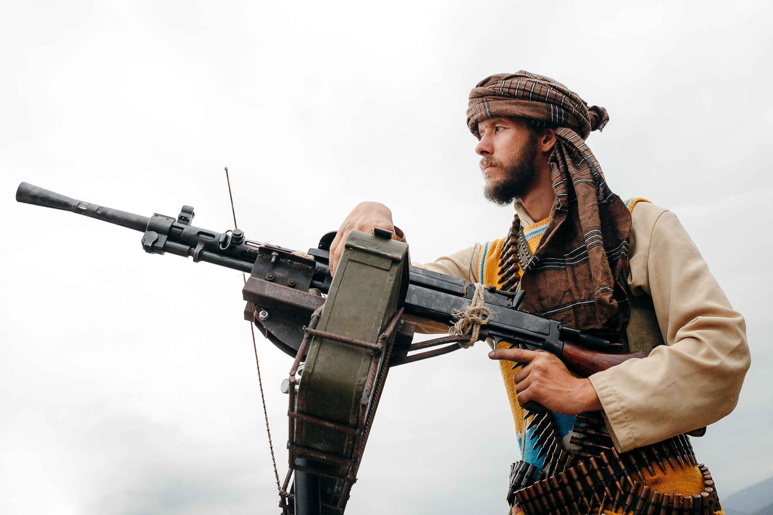 Soldier reenactor with machine gun