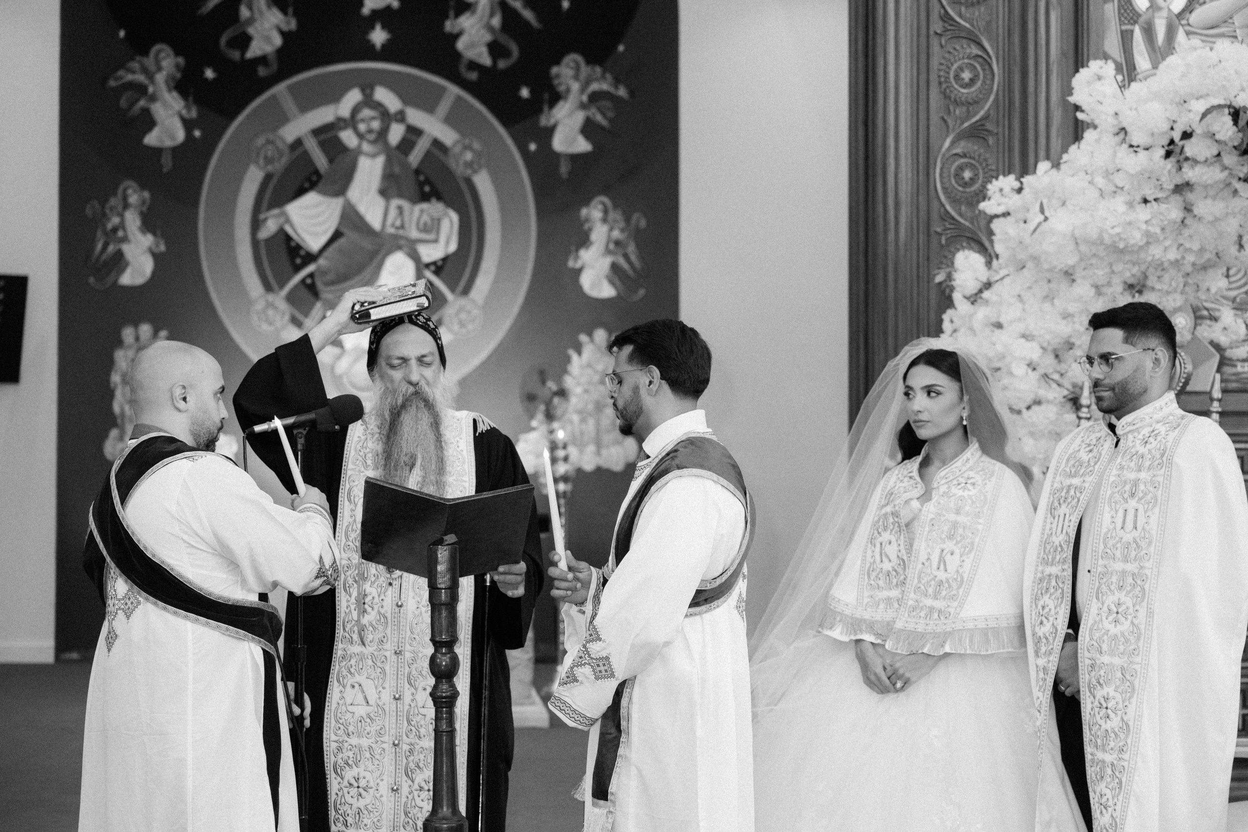 Black and white portrait of the couple during the church ceremony