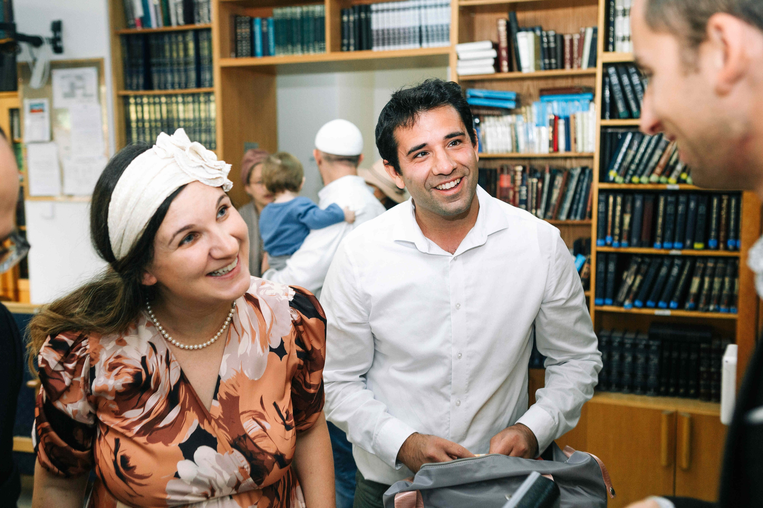 BRITH MILA IN THE SMALL SYNAGOGUE. PHOTOGRAPHER IN ISRAEL