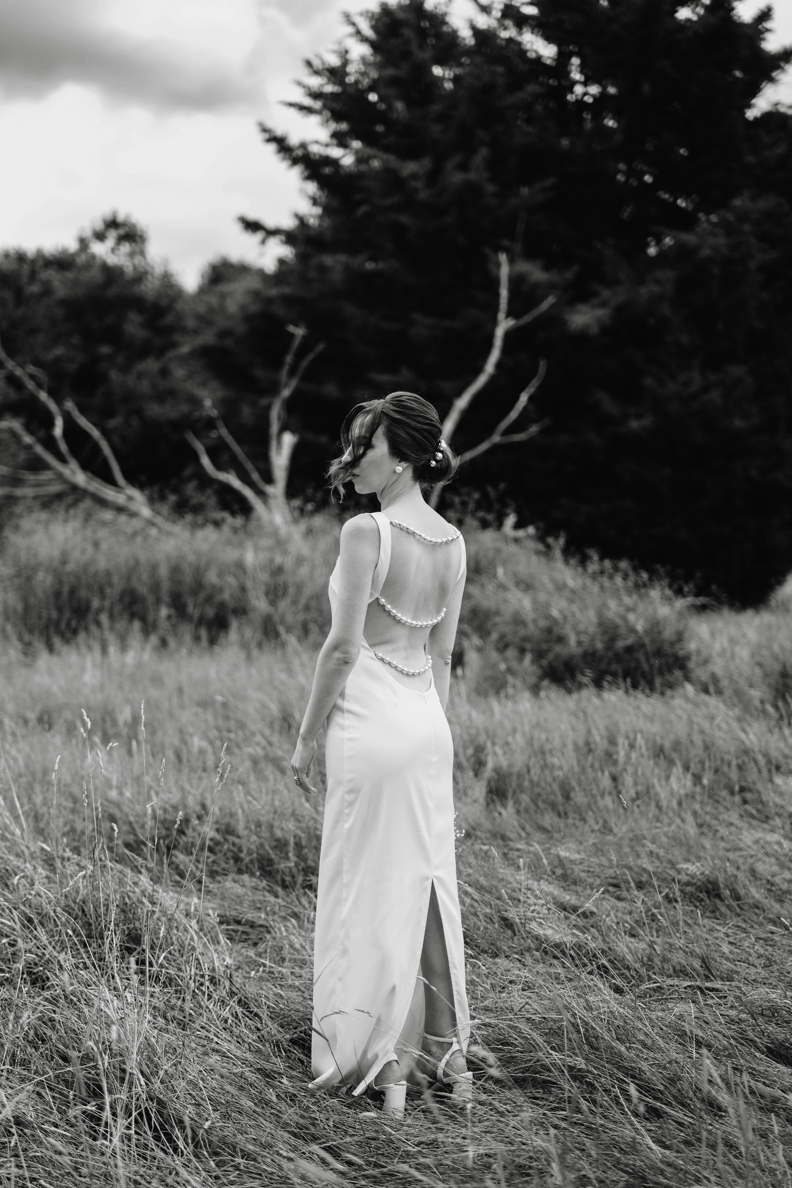 black and white photo of a bride from the back
