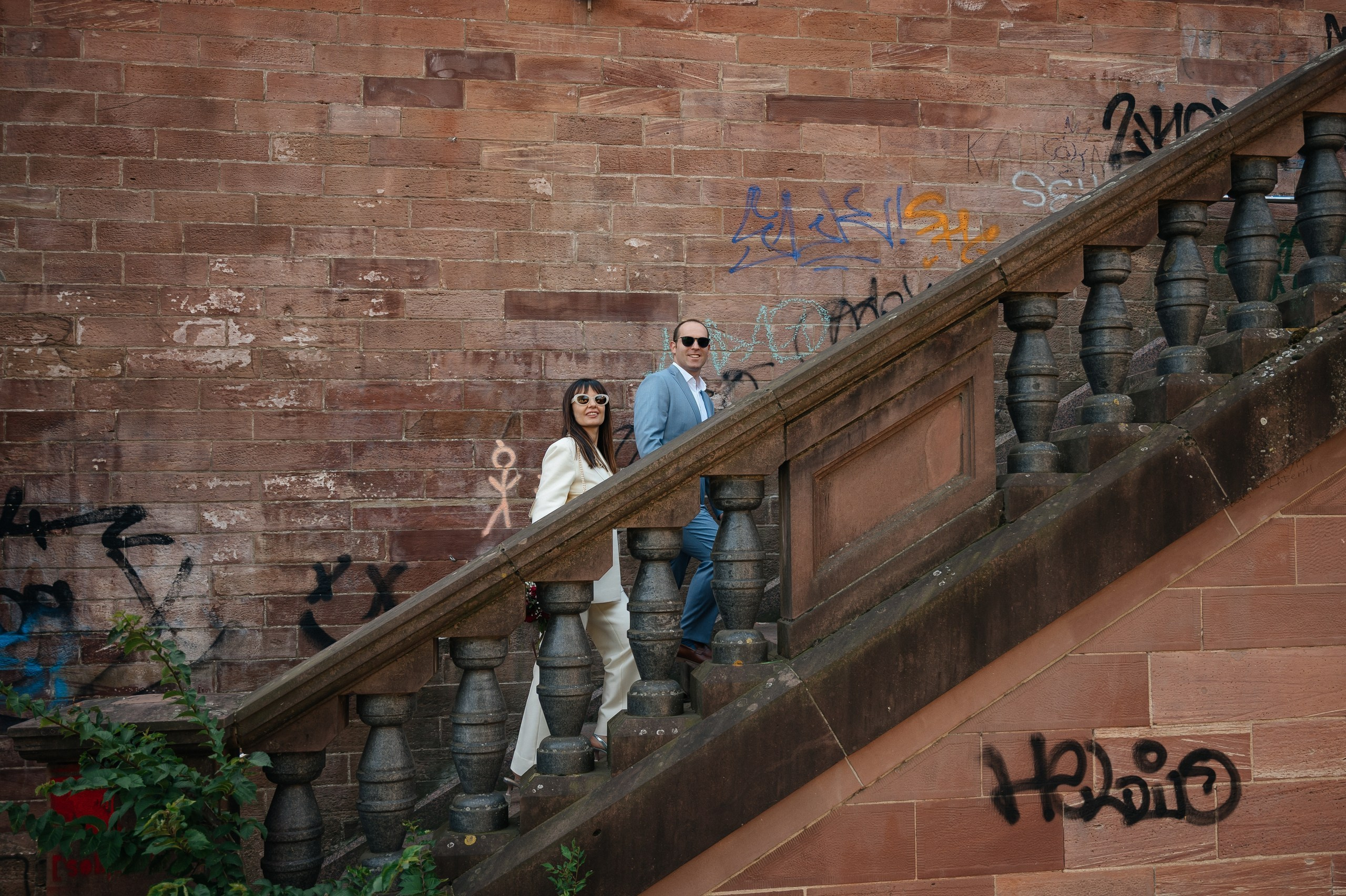 couple going steps up to the bride
