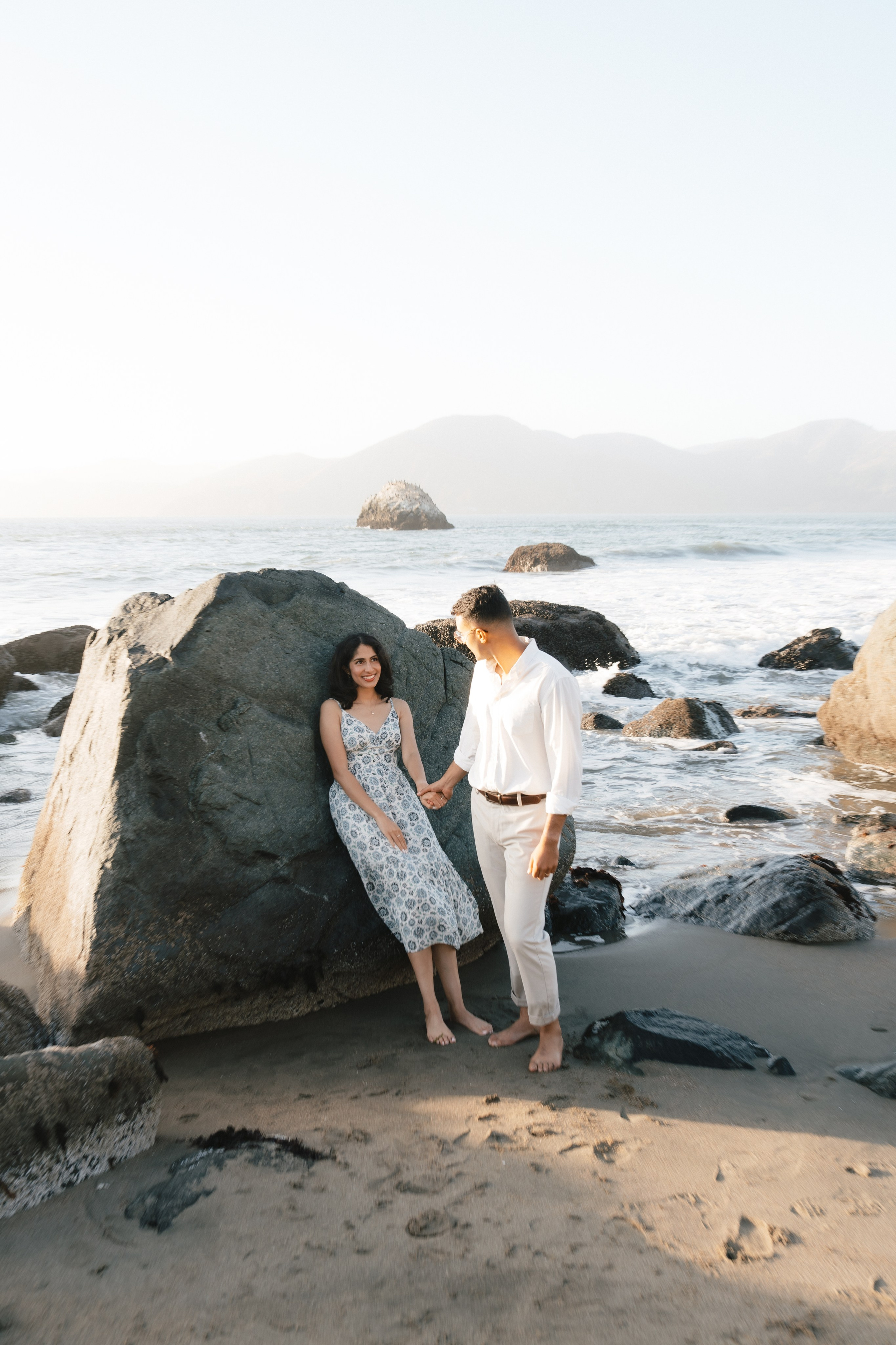Engagement and Couple’s Photoshoot at Marshall’s Beach with iconic Golden Gate bridge view. Soulo Photography | San Francisco Bay Area Based Photographer