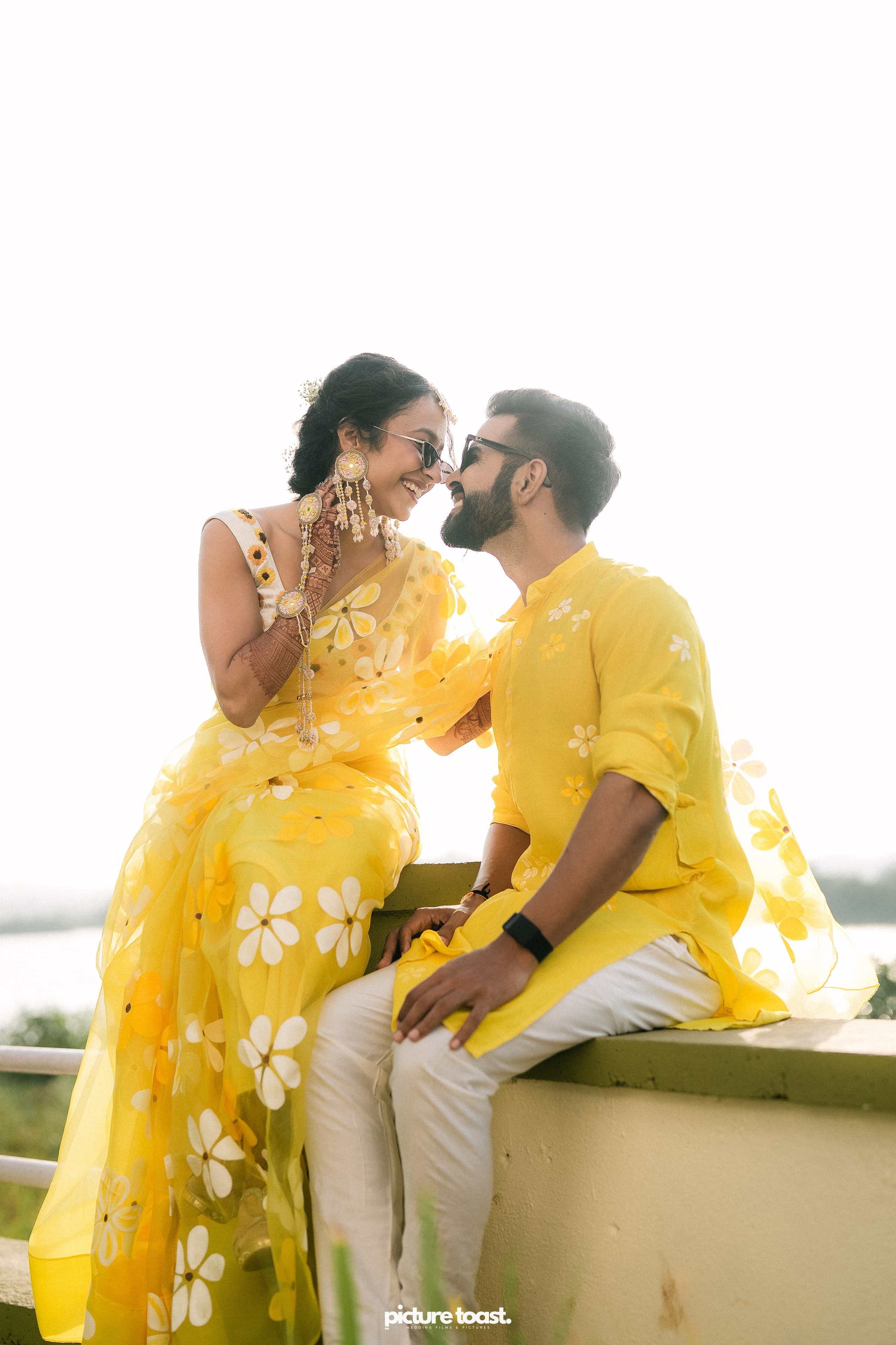 Haldi Hues Ft. Baebie & Goyal. Fine art Wedding Photographers in India & Canada