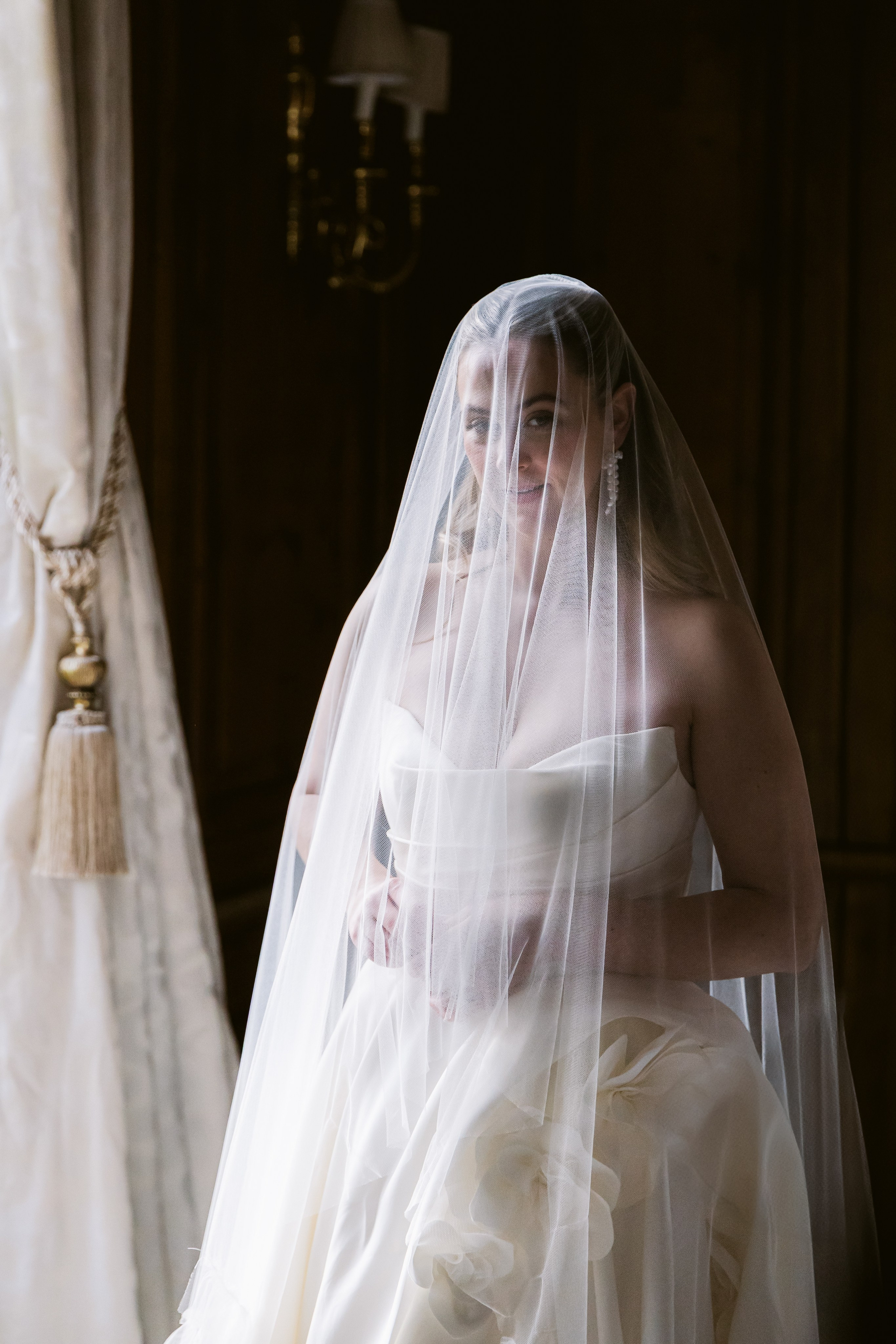 Elegant wedding portrait of bride and groom walking through the streets of ParisRomantic elopement moment captured in soft evening light in Paris, FranceLuxury wedding ceremony setup in a historic French venue with natural floralsCandid black and white photo of a couple at their city wedding in London, UKTimeless couple portrait in front of Marylebone Town Hall, LondonEditorial-style bridal preparation in a classic townhouse in the heart of LondonSoft light bridal portrait in a countryside château wedding in FranceFine art flat lay with French-inspired wedding details and vintage texturesCinematic golden hour photo at a UK estate wedding with historic architectureLuxury wedding tablescape with candles and florals at a London reception