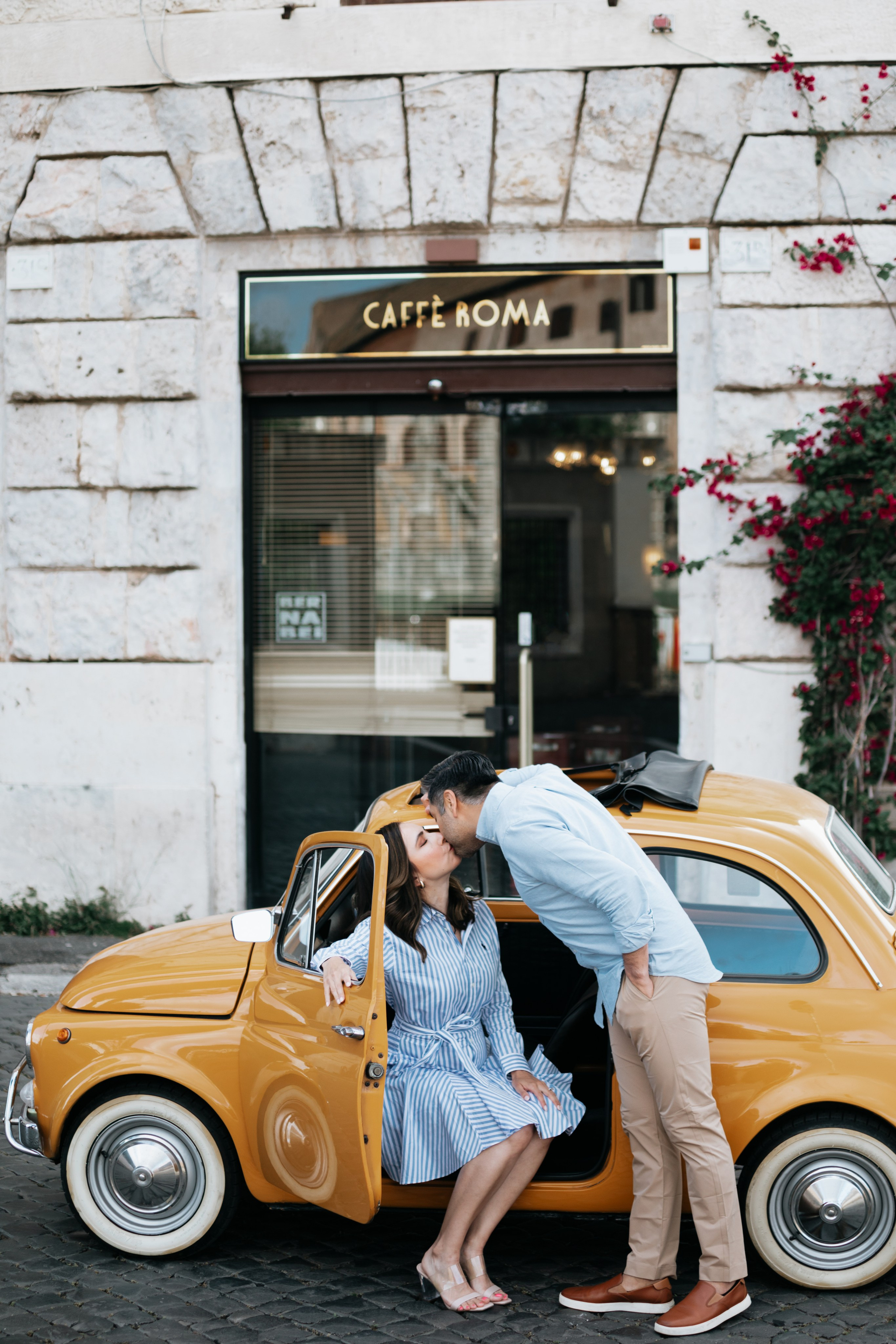 Fiat 500 and Vespa. Photographer in Rome