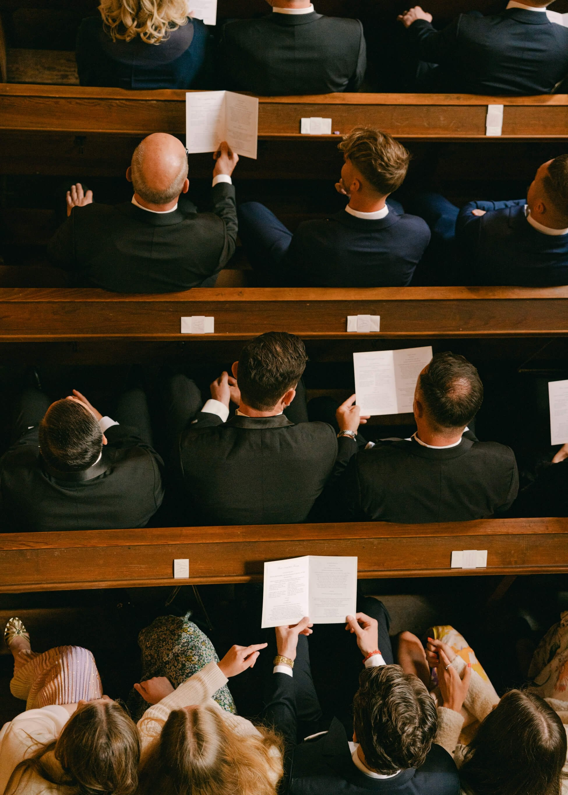 Wedding guests seated in church during ceremony, black tie wedding Frankfurt Villa Rothschild