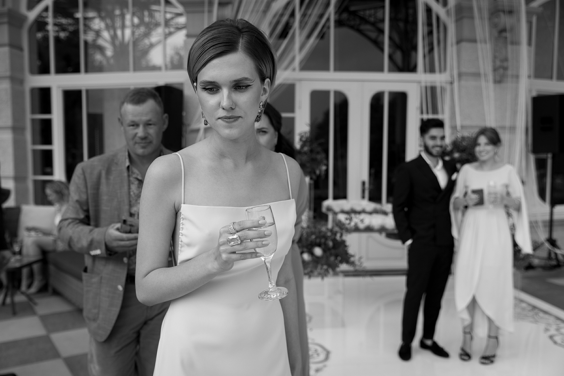Guests at wedding ceremony, by Cornwall editorial photographer.