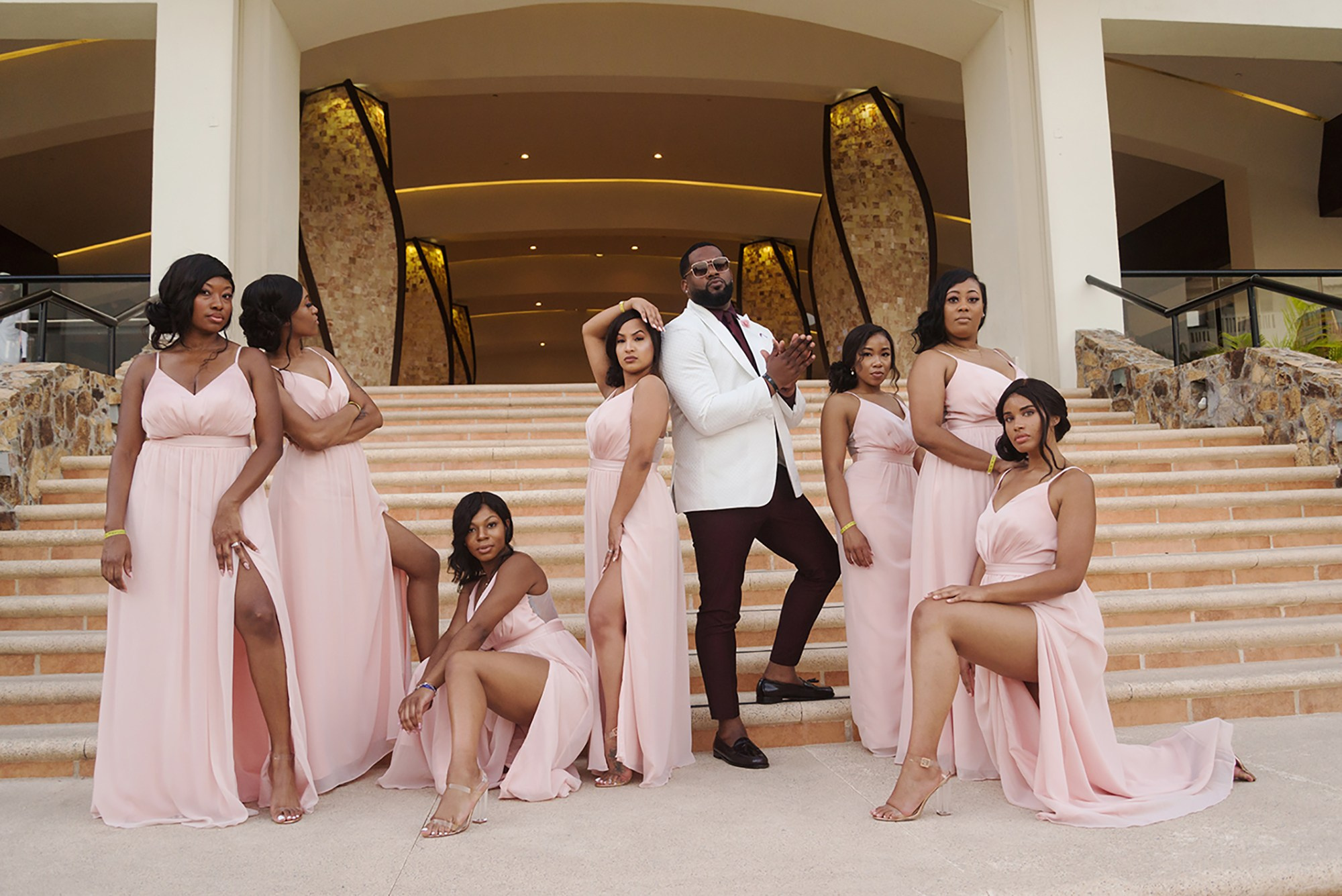 Hyatt Ziva Los Cabos wedding – stylish bridal party portrait with bride and groom, luxury destination celebration