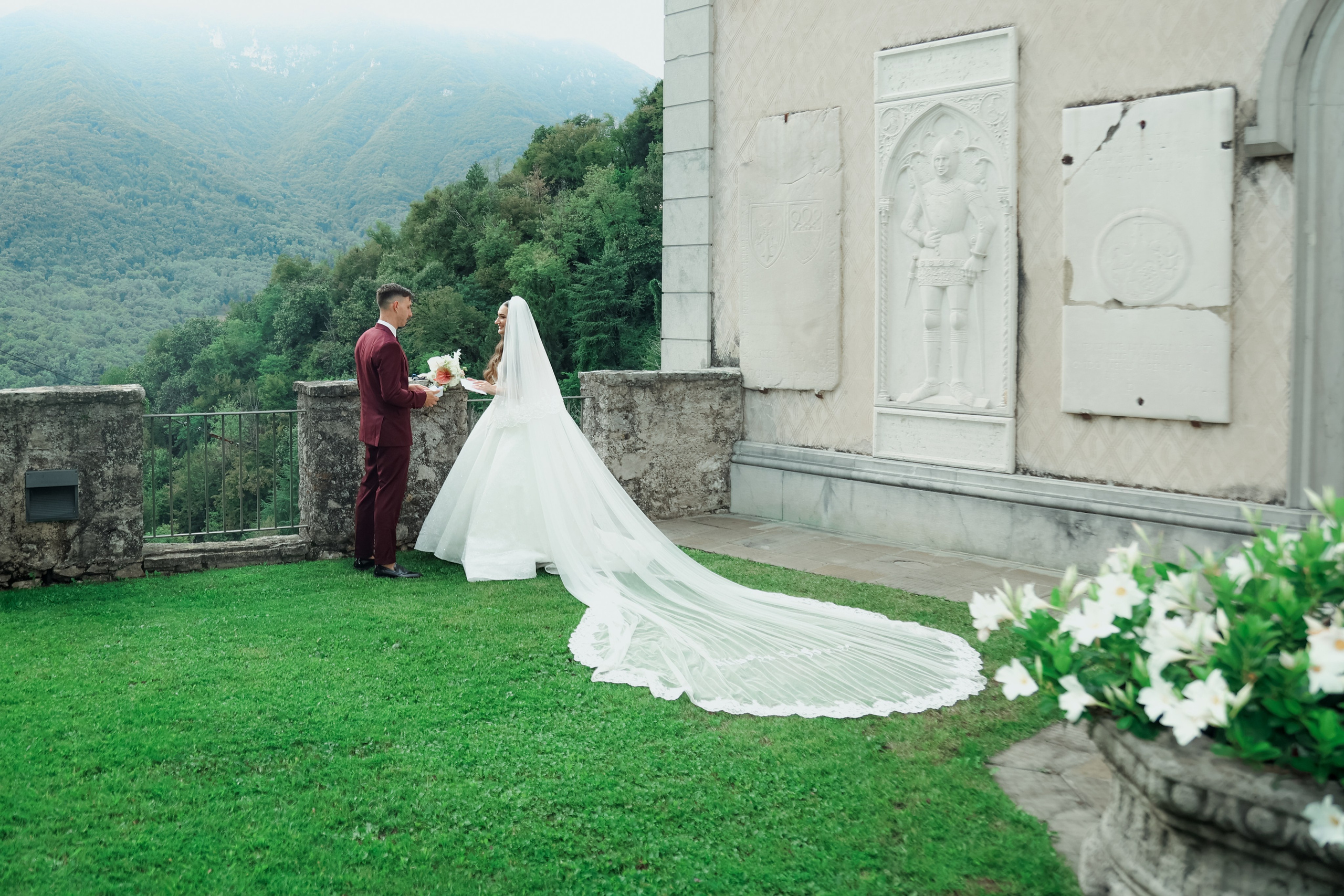 The couple exchanging vows in front of family and friends