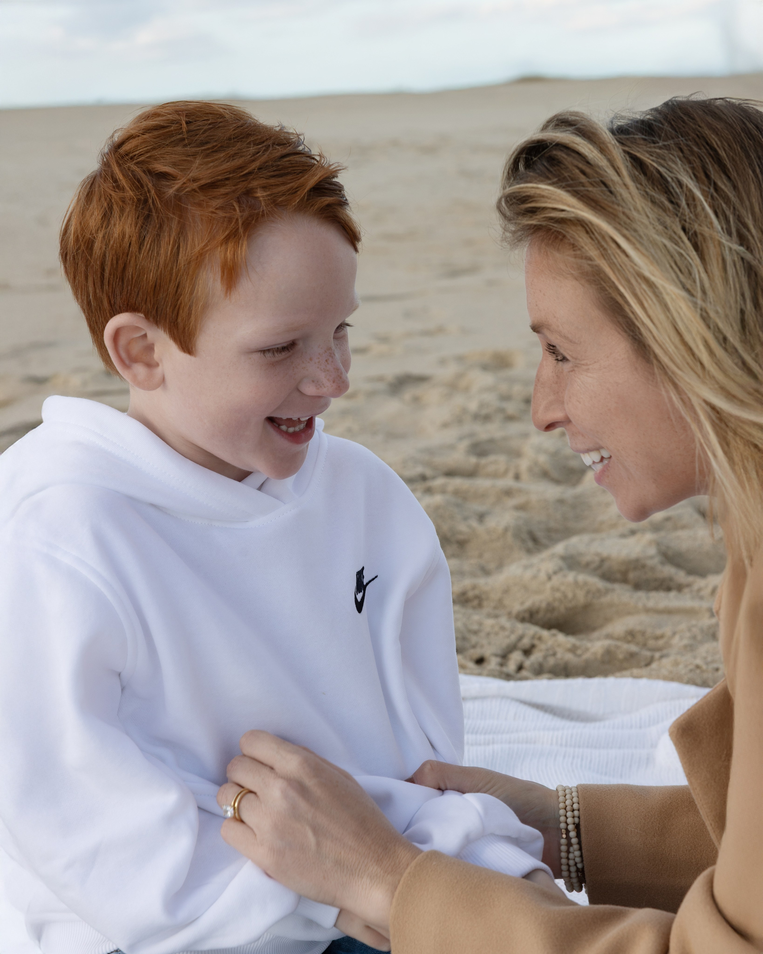 Sun, Sand, and Family Hugs. Family, lifestyle, and commercial photography in New York and New Jersey