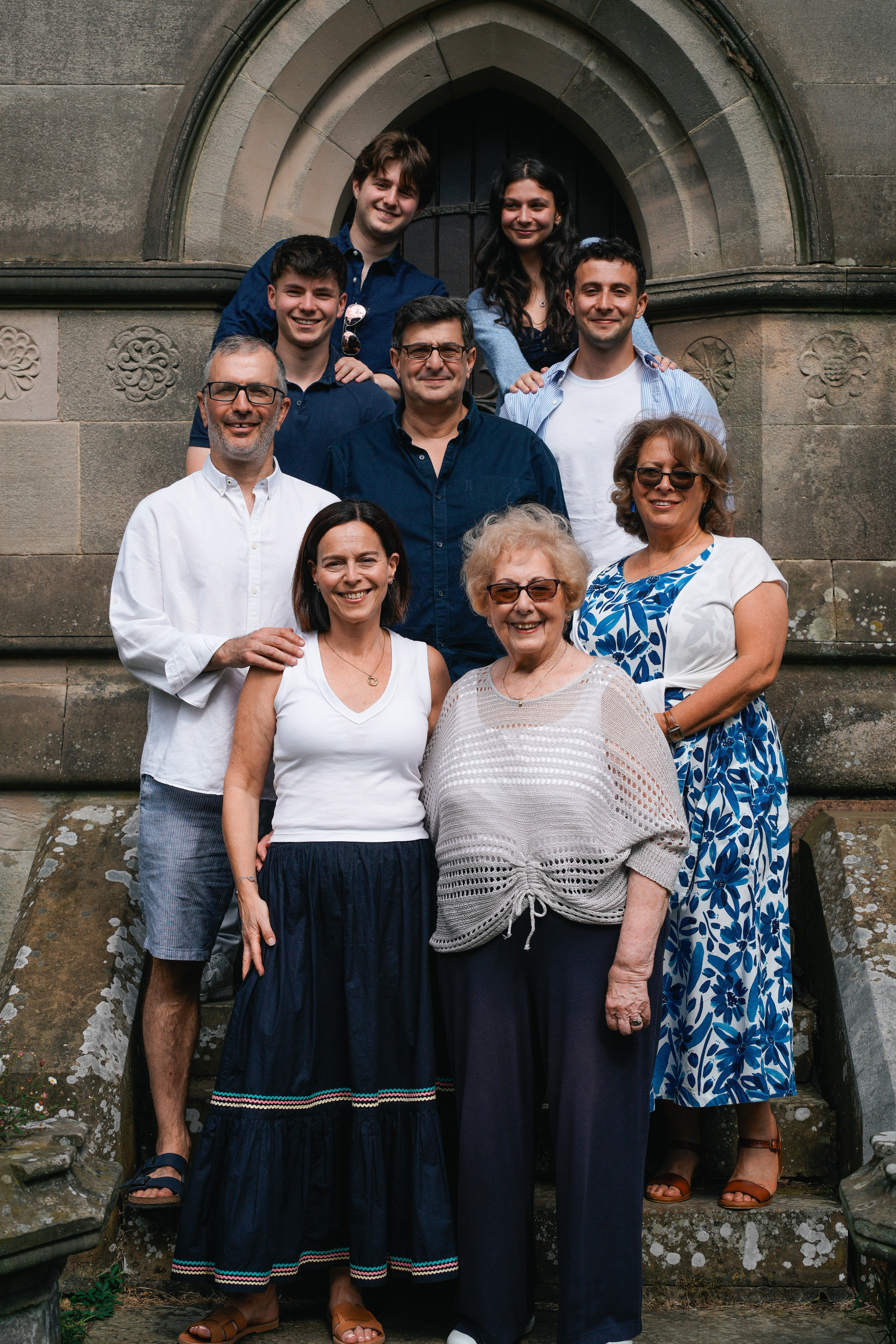 Family portrait in Hampton-in-Arden for 90th birthday celebration – mum with son, daughter and grandchildren, full of joy and warmth.