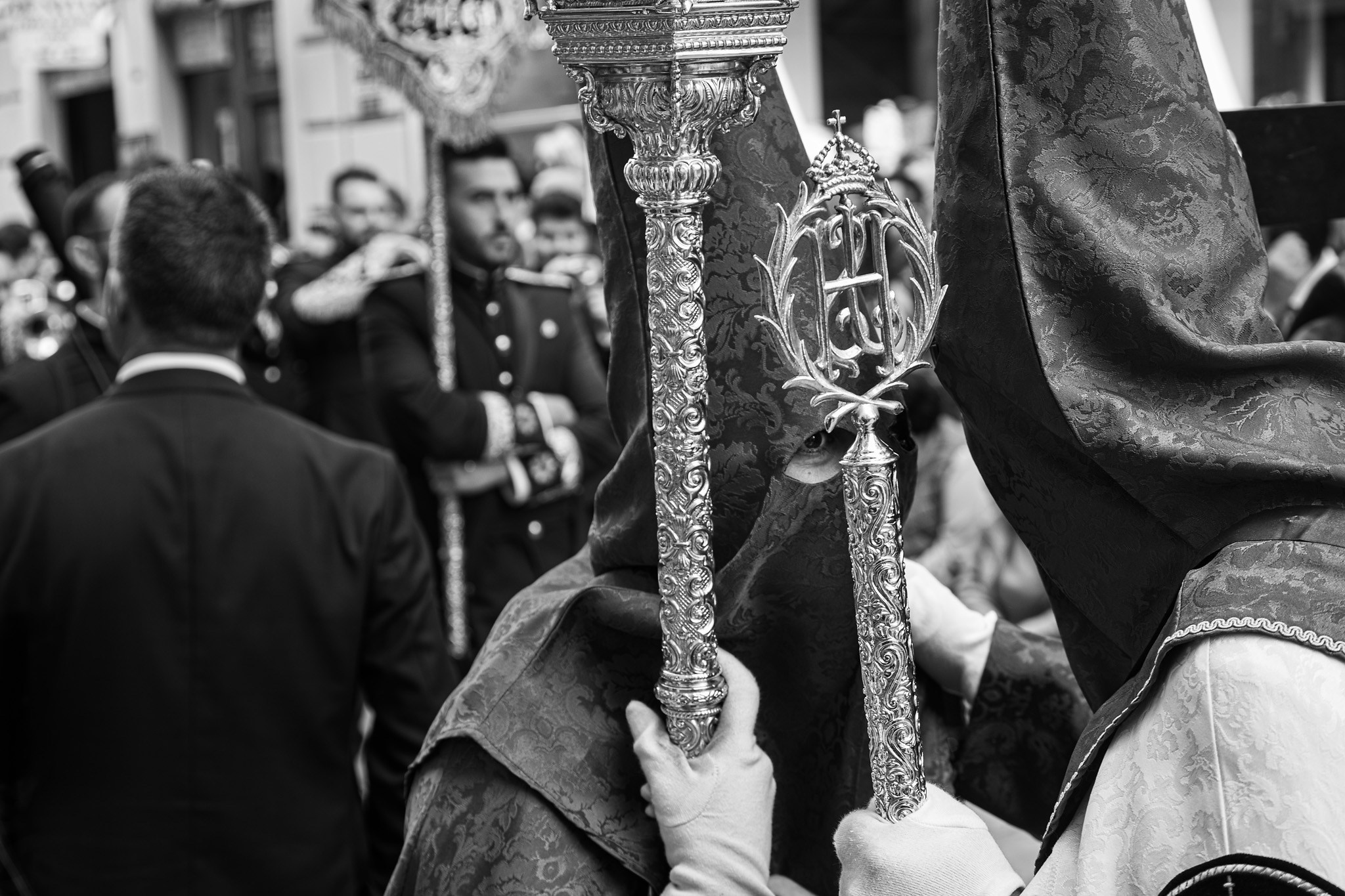 Women in traditional brotherhood mantilla during Holy Week procession