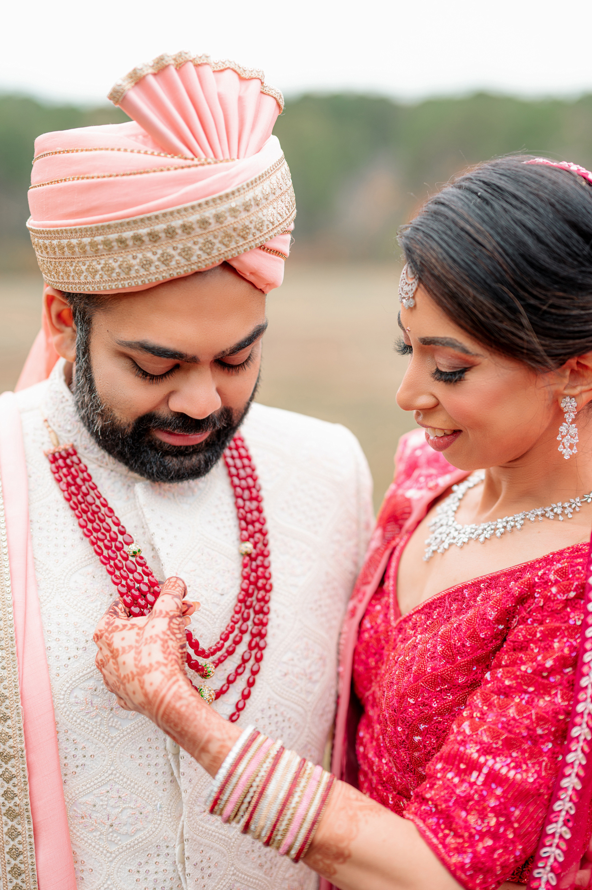 a man and woman in traditional indian attire