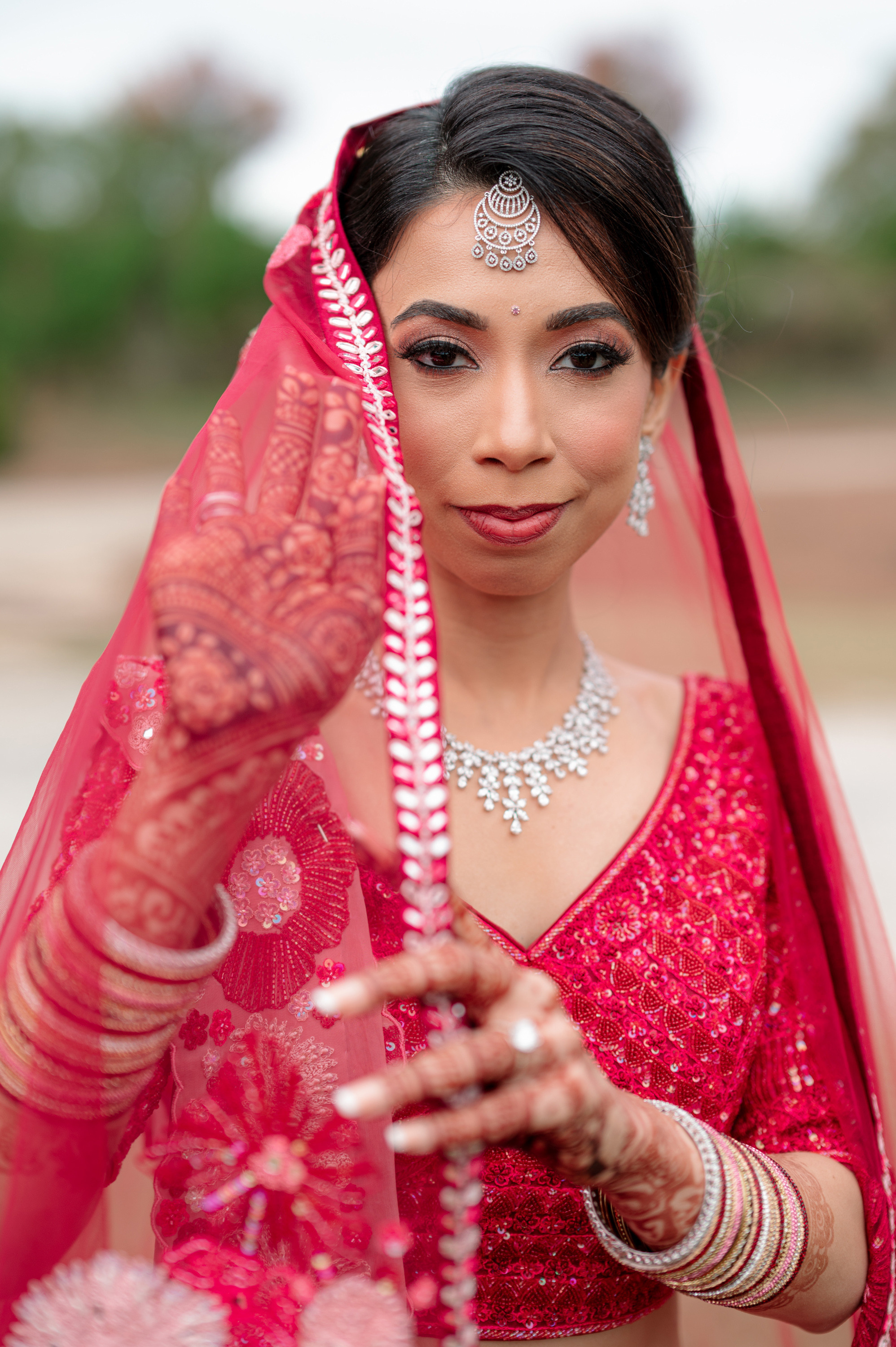 a bride in a red sari
