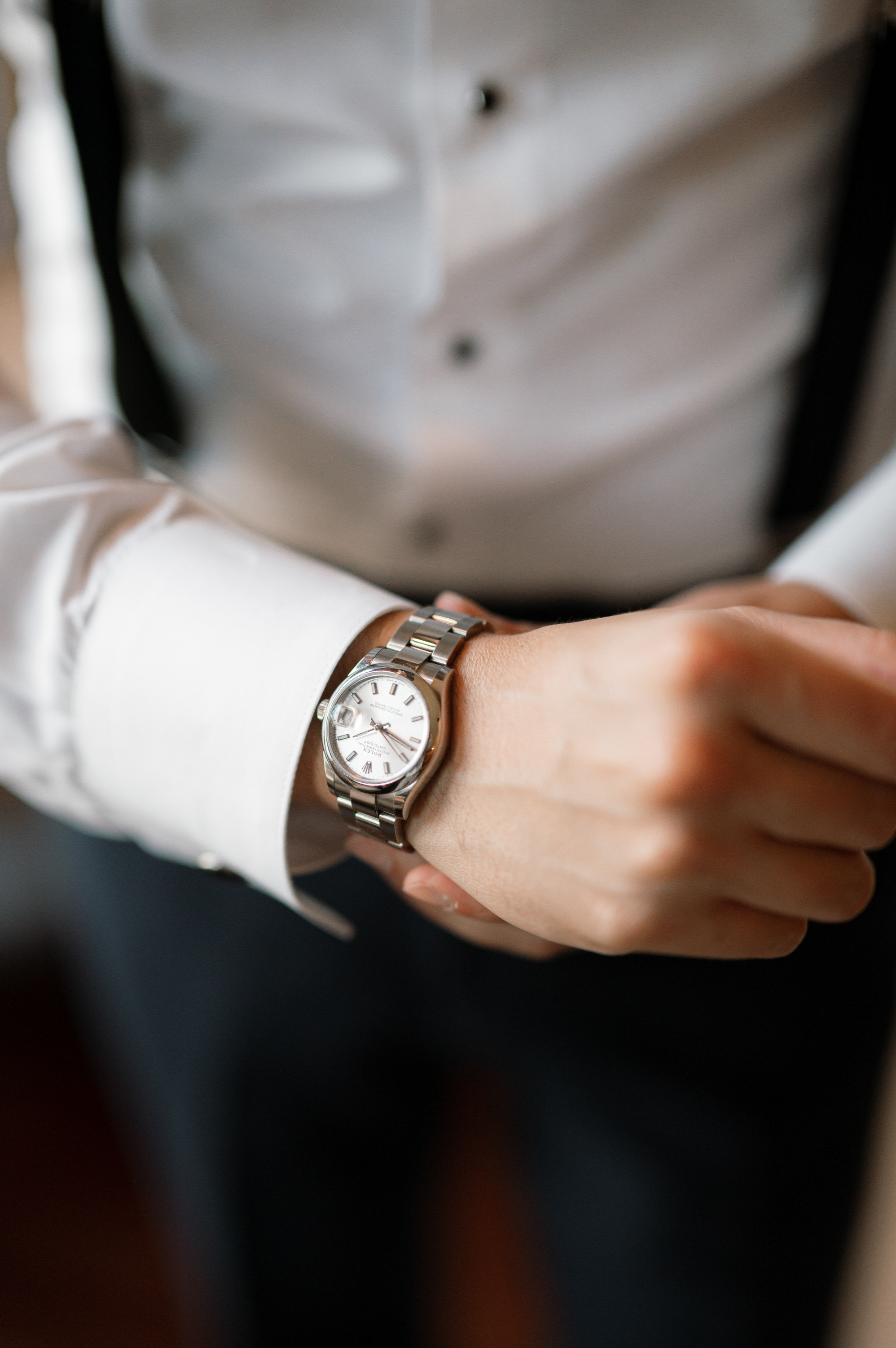 a man wearing a watch on his wrist