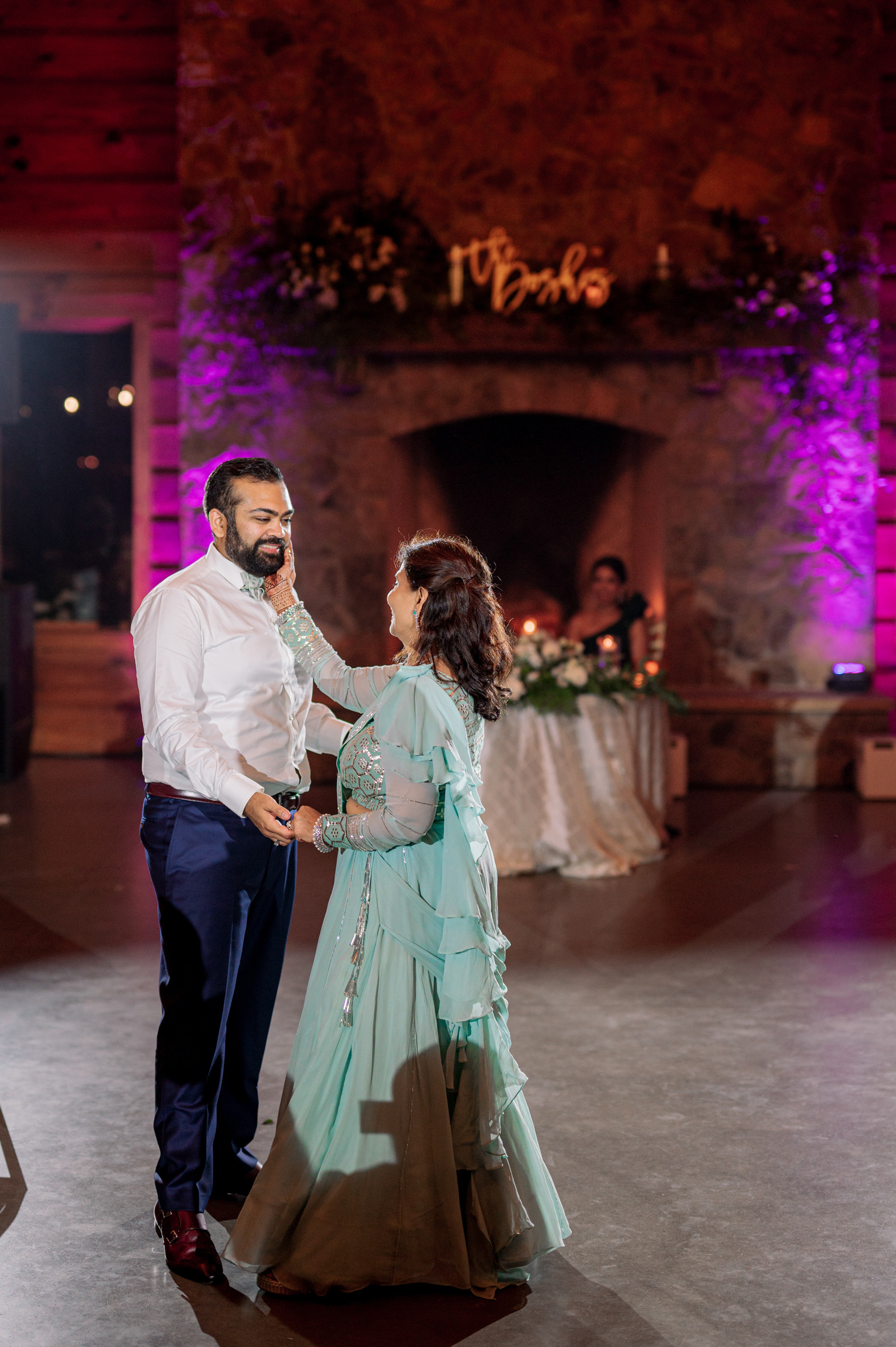 a man and woman dancing in a room