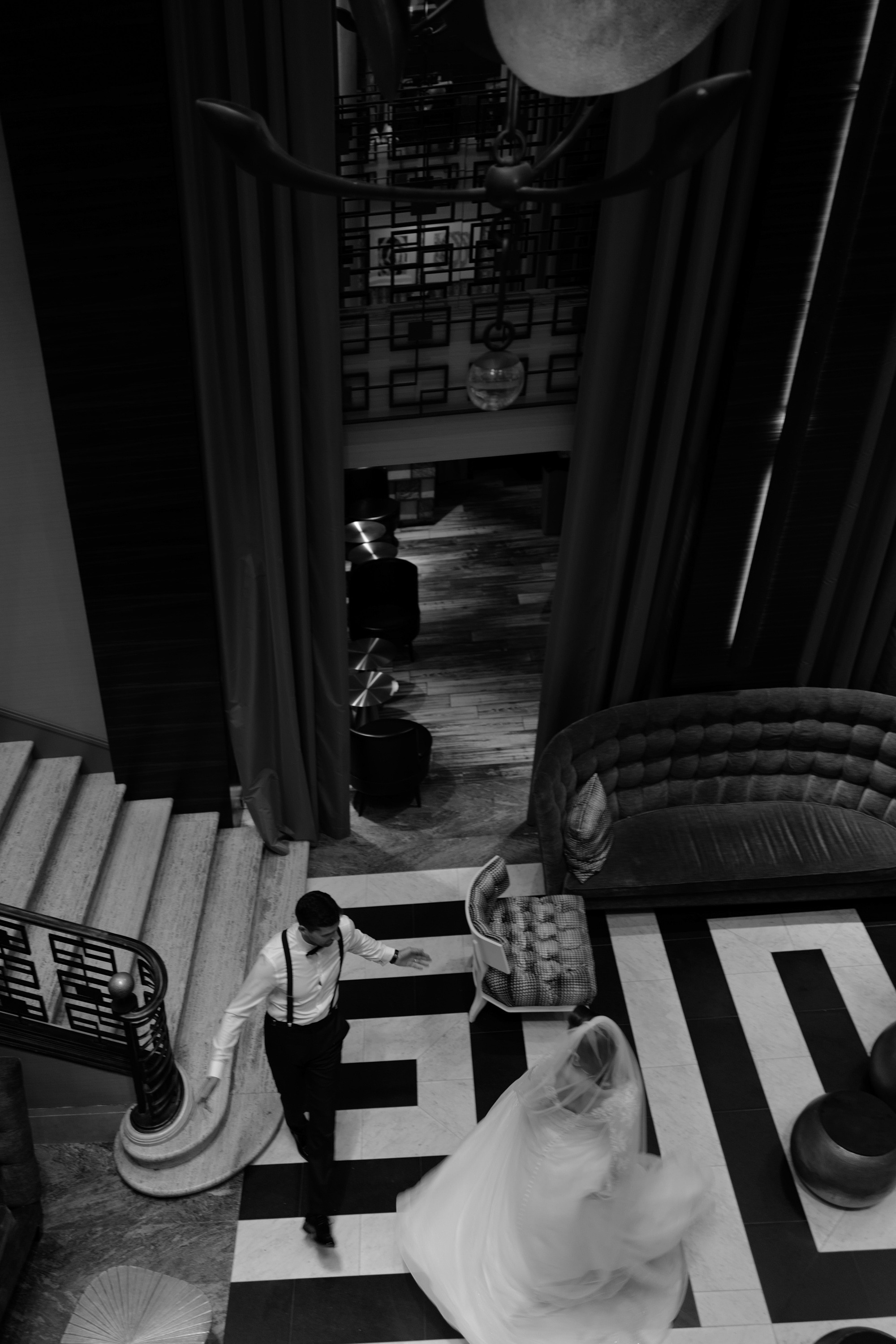 a woman sitting on a couch in a living room