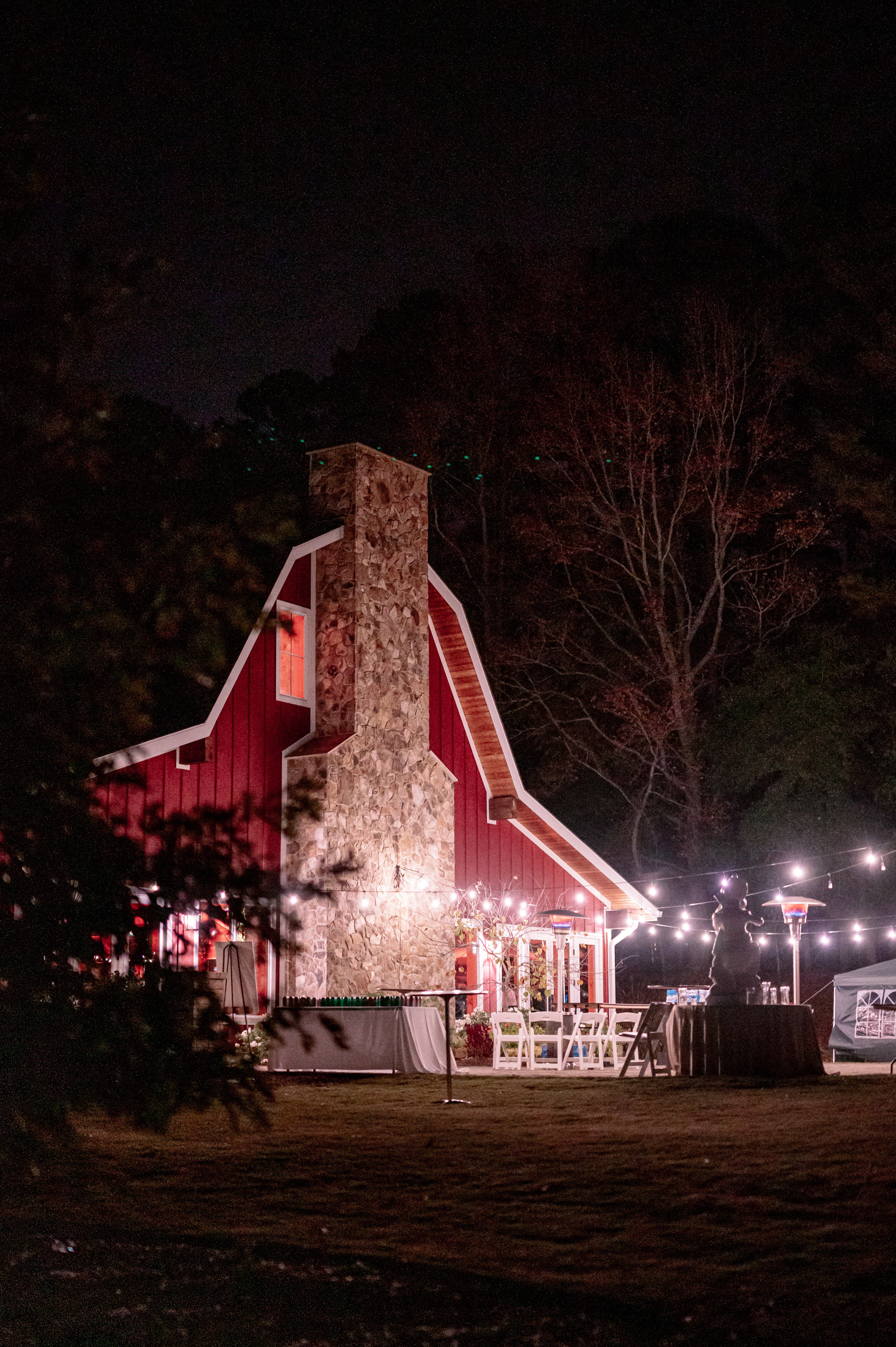 a barn with a fire place and a fire place