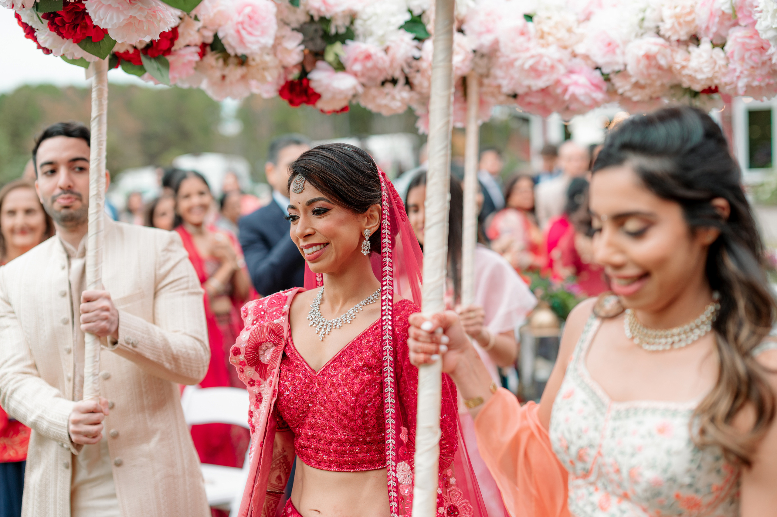 a woman in a pink lehen