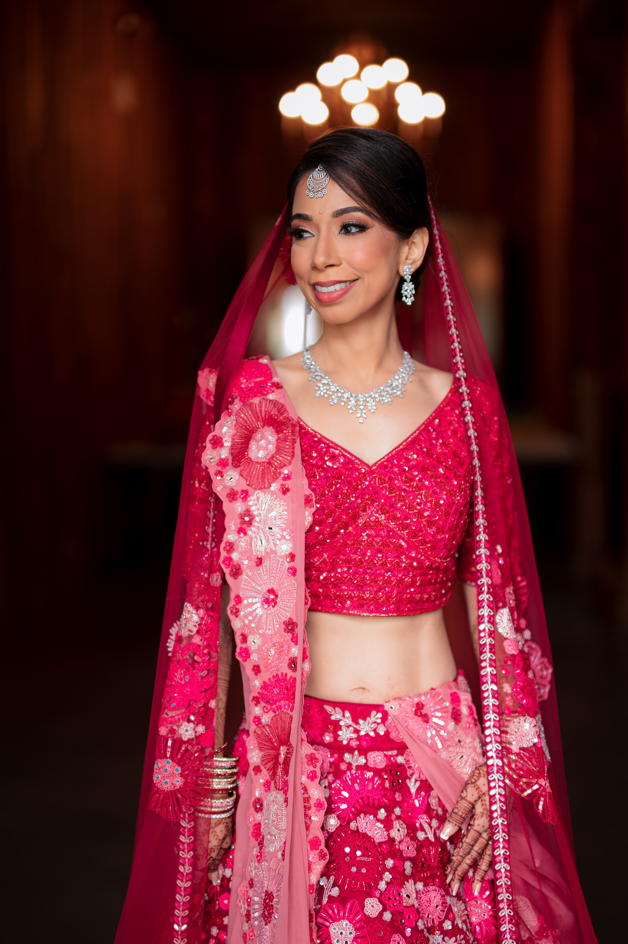 a bride in a pink lera with a pink lera