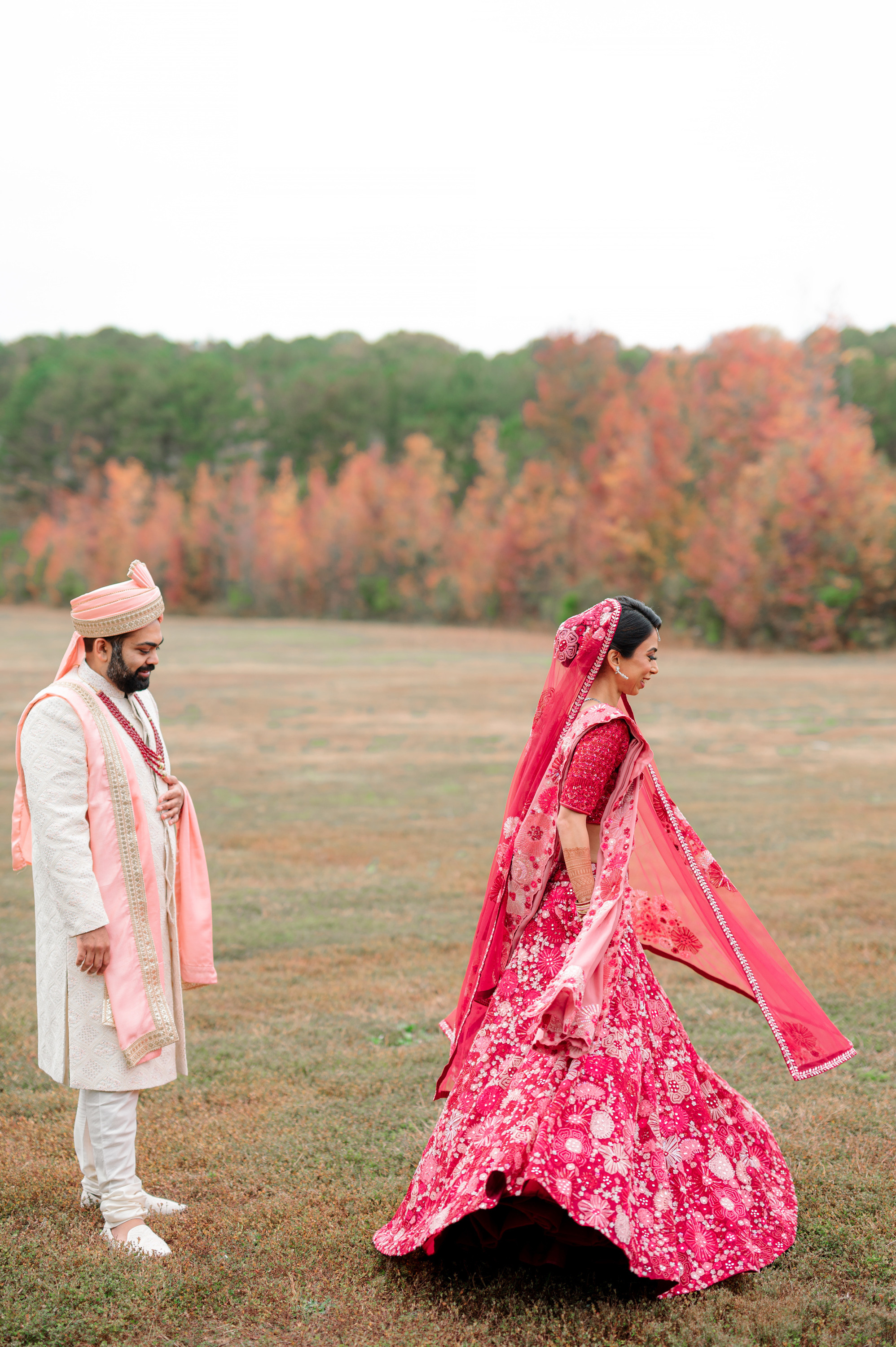 a man and woman in traditional indian attire