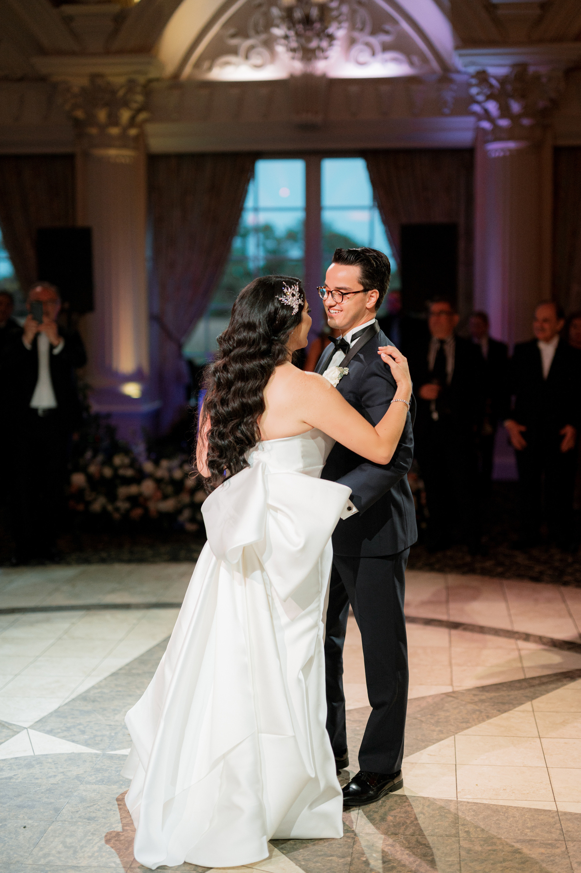 a bride and groom sharing a first dance