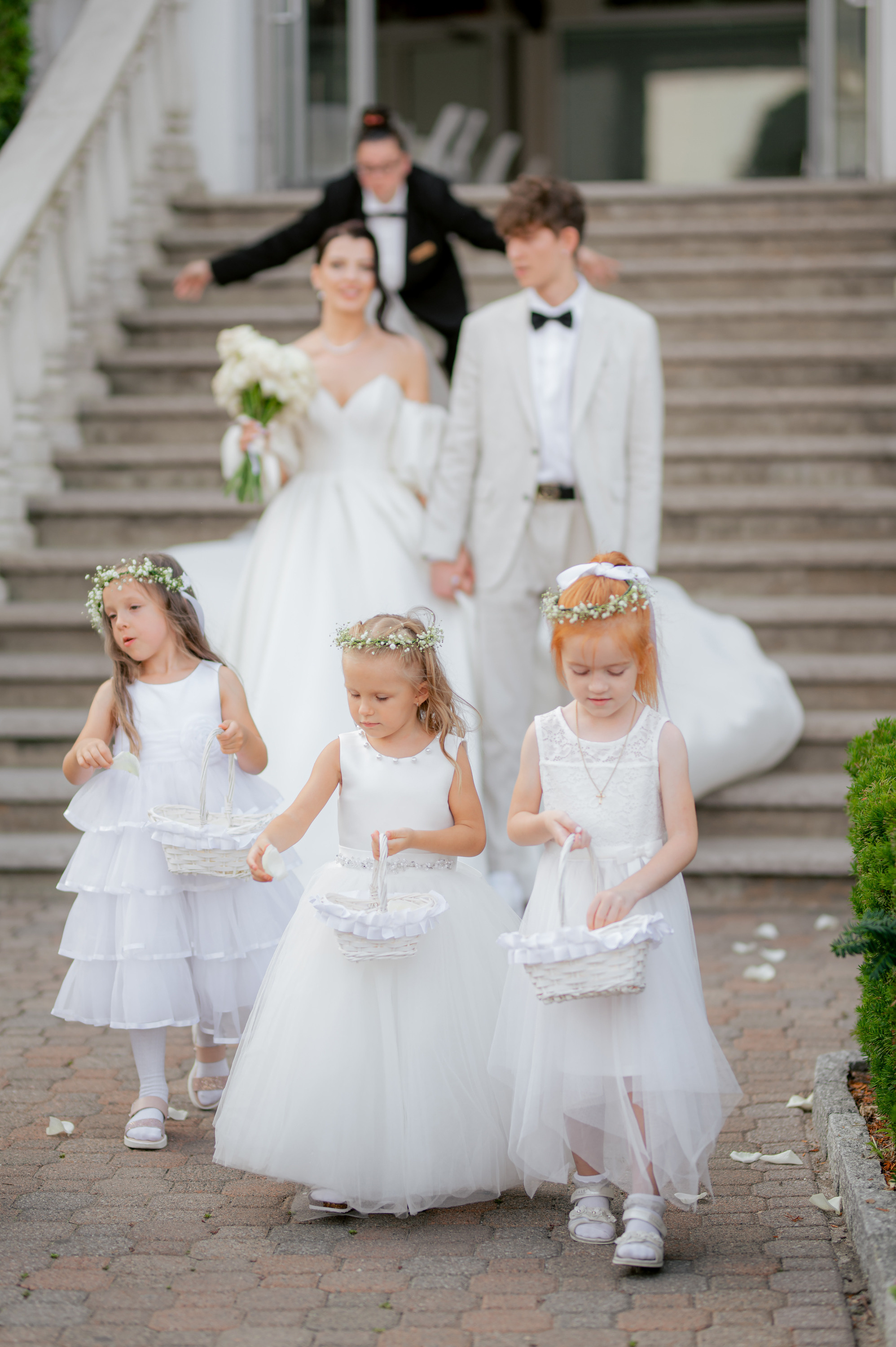 flower girls in white dresses