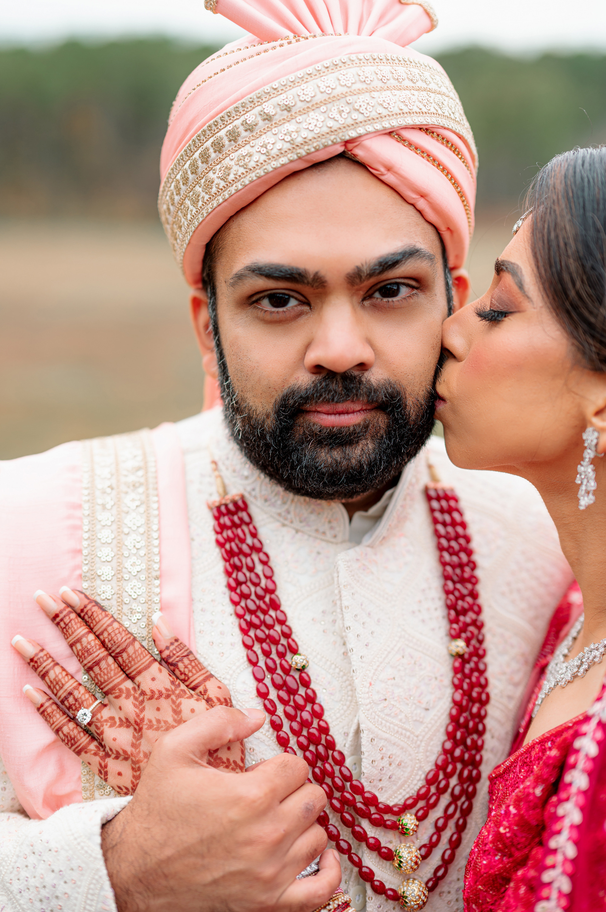 a man and woman in traditional indian attire