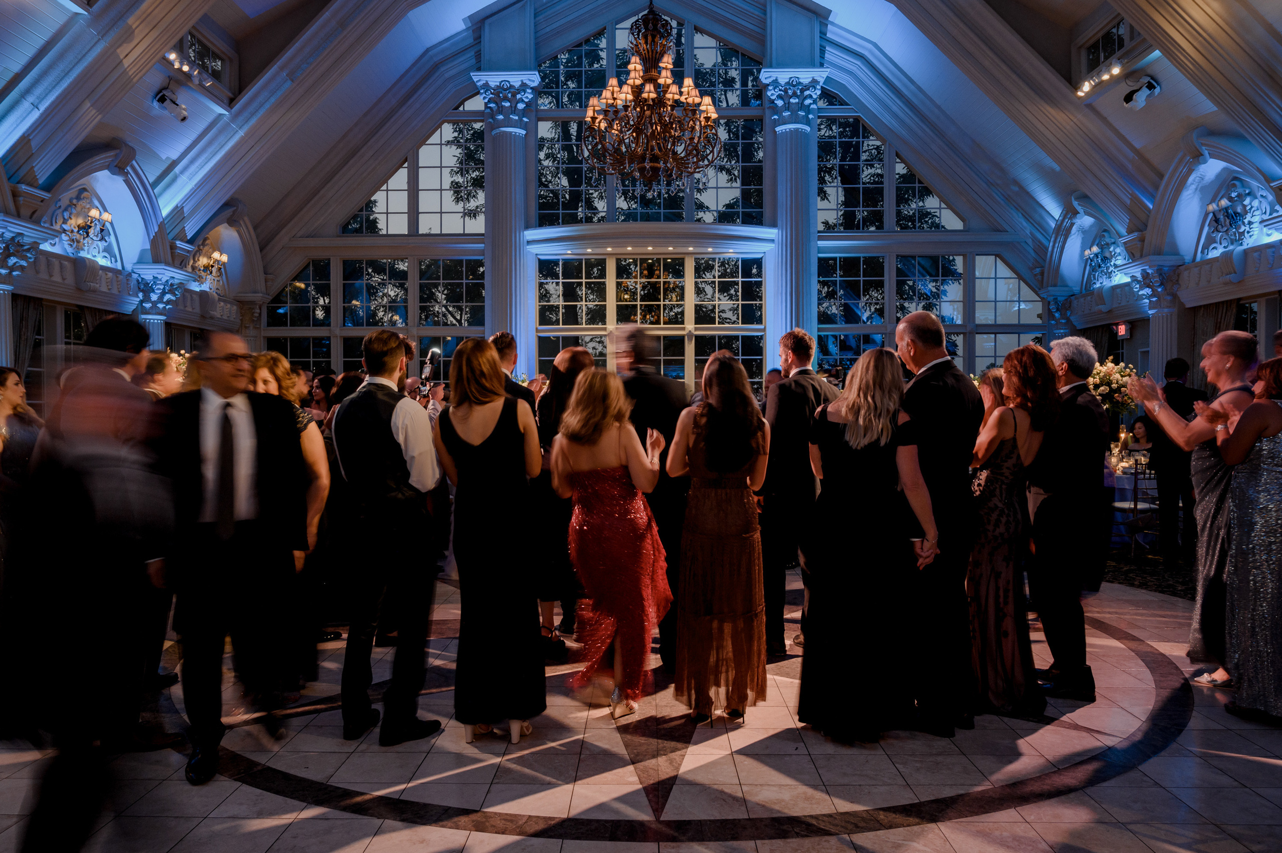 a group of people standing in a room