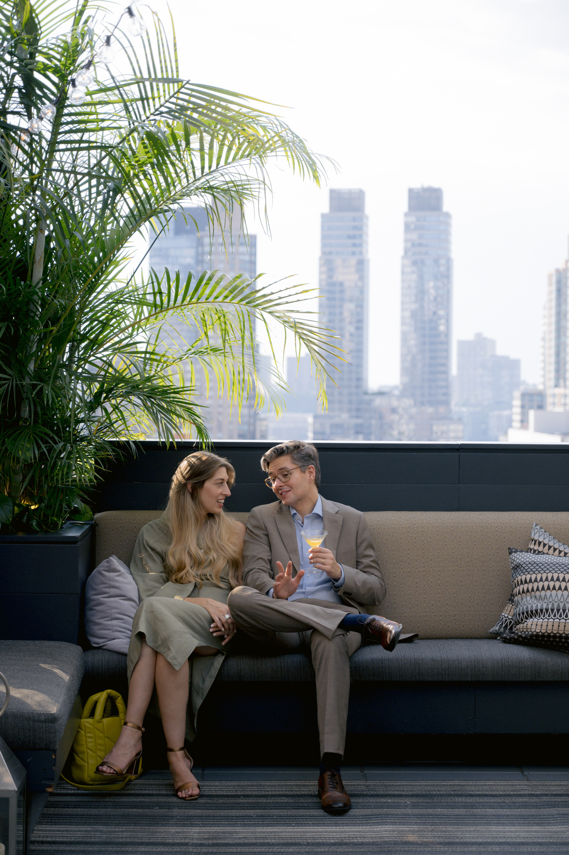 a man and woman sitting on a couch