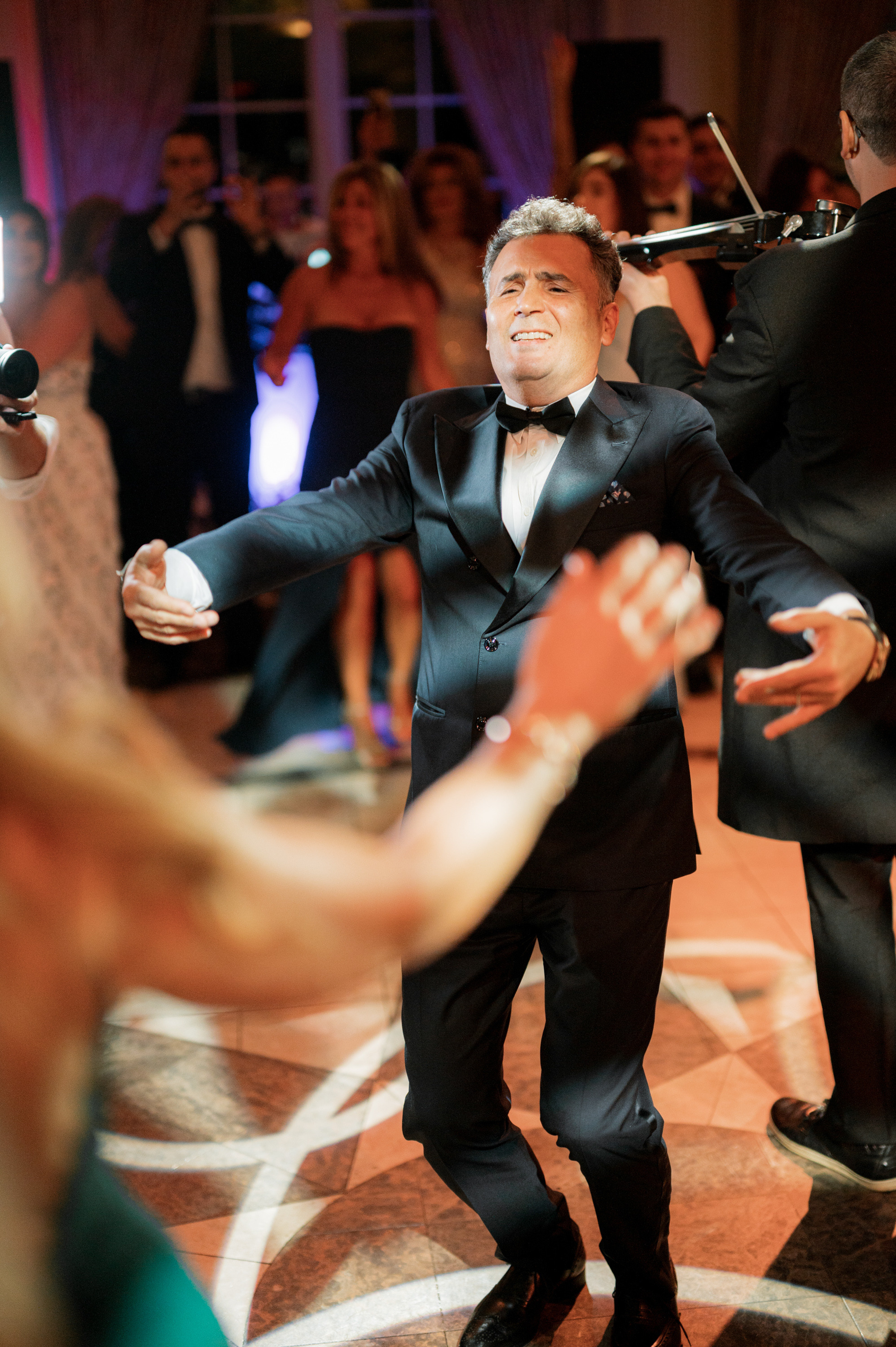 a man in a tuxed tuxed tuxed tuxed tuxed tuxed tuxed tuxed tuxed tuxed tuxed tuxed