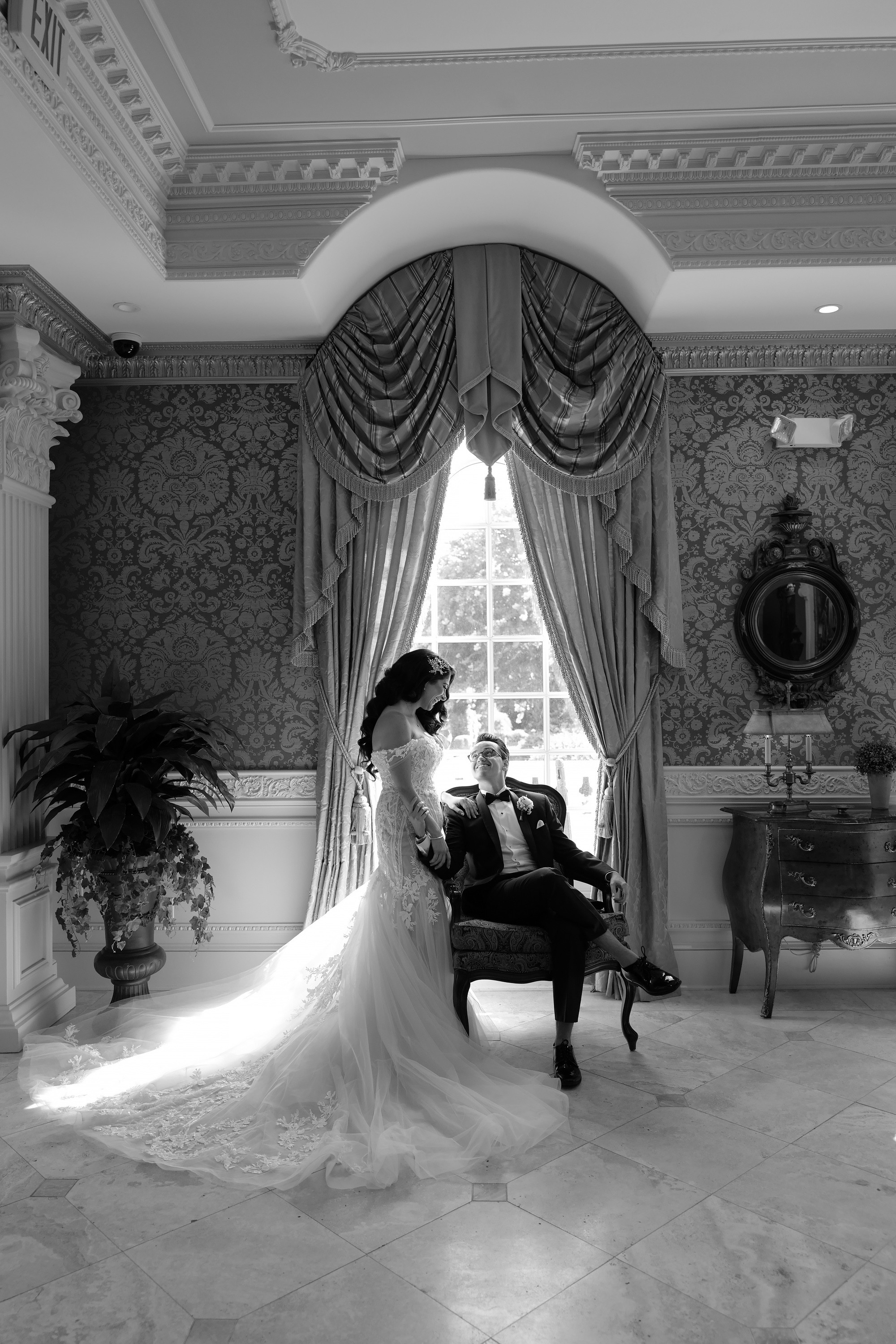 a bride sitting in a chair in a room