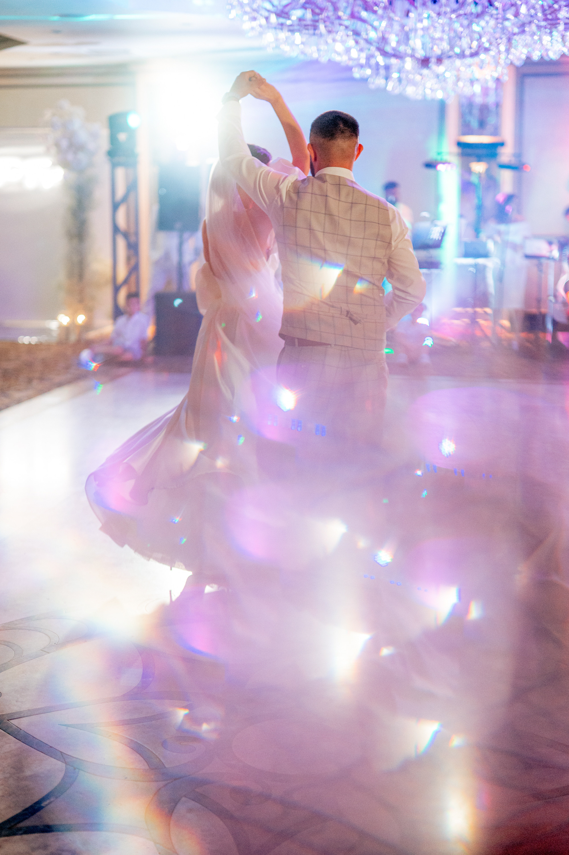 a man and woman dancing in a room