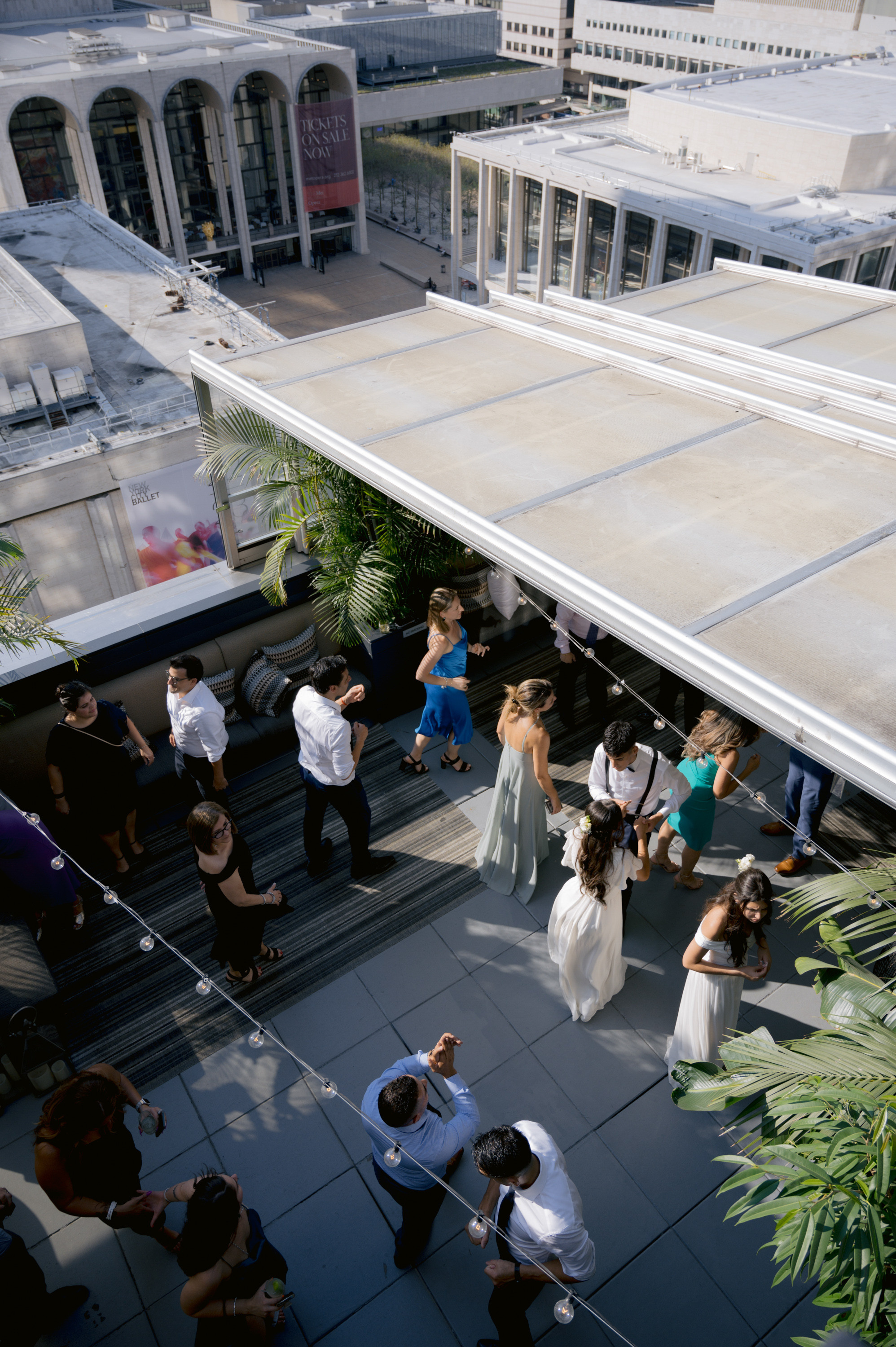 a group of people standing on a roof