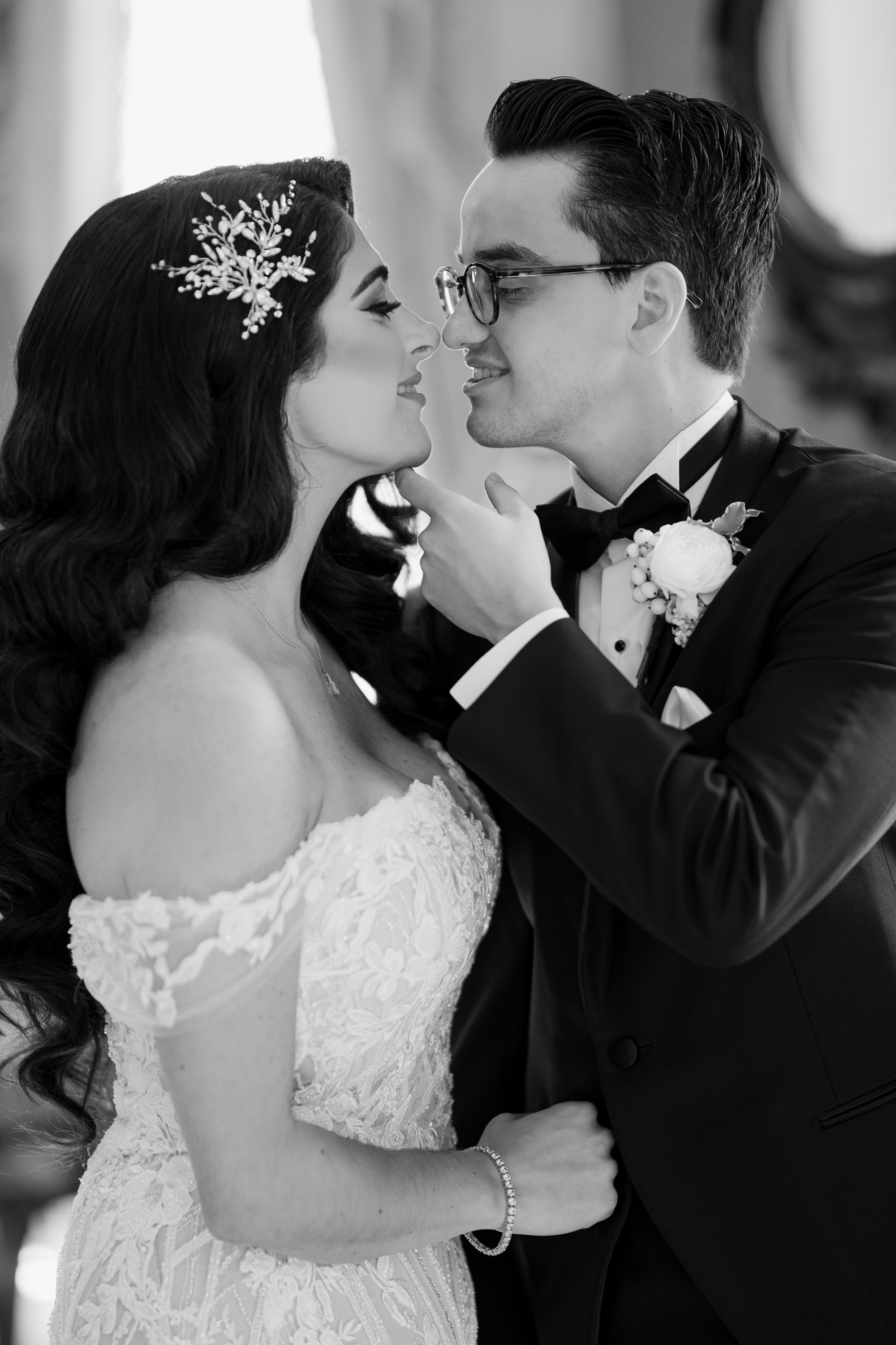 a bride and groom sharing a kiss in the church