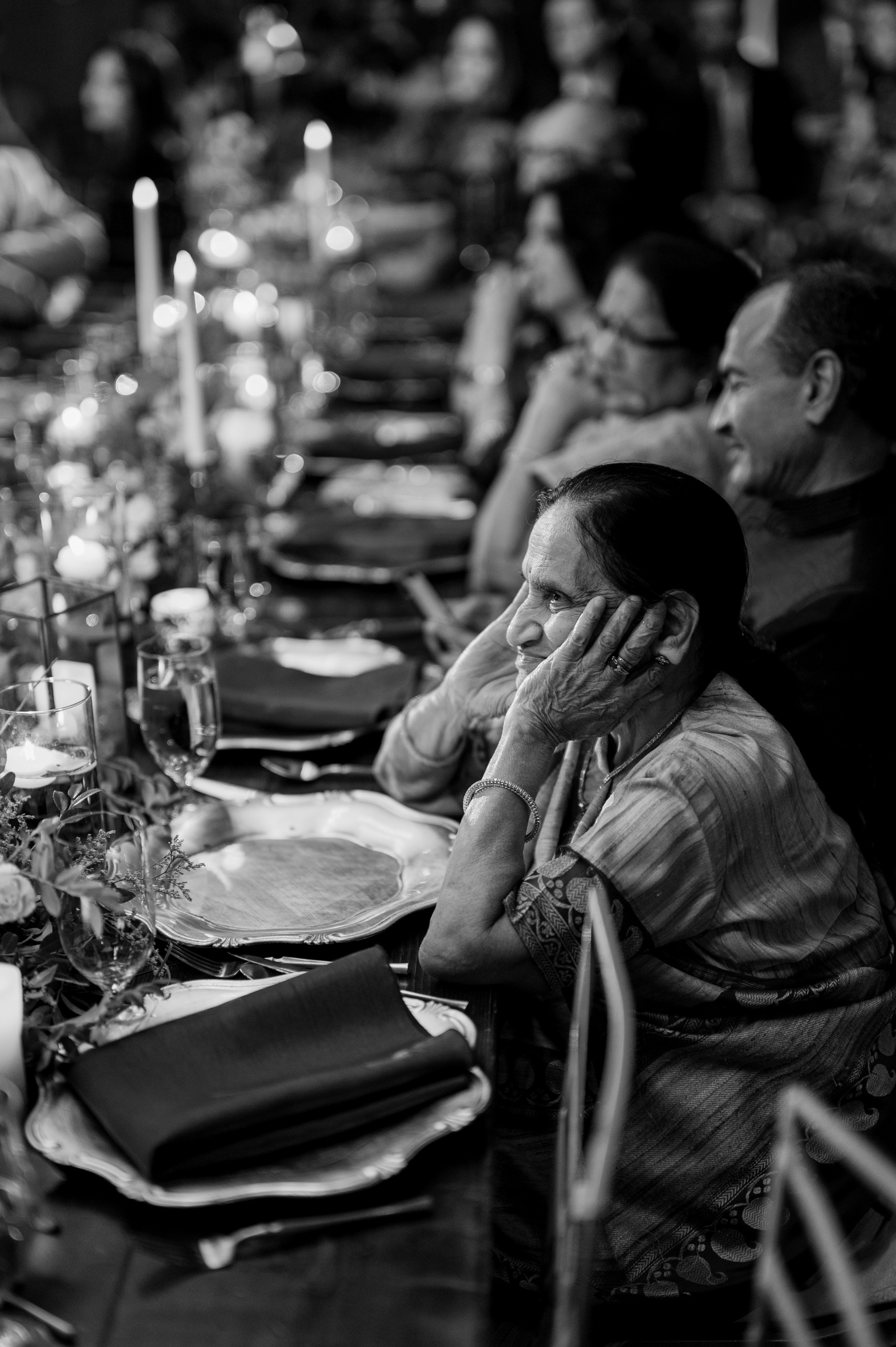 a group of people sitting at a table