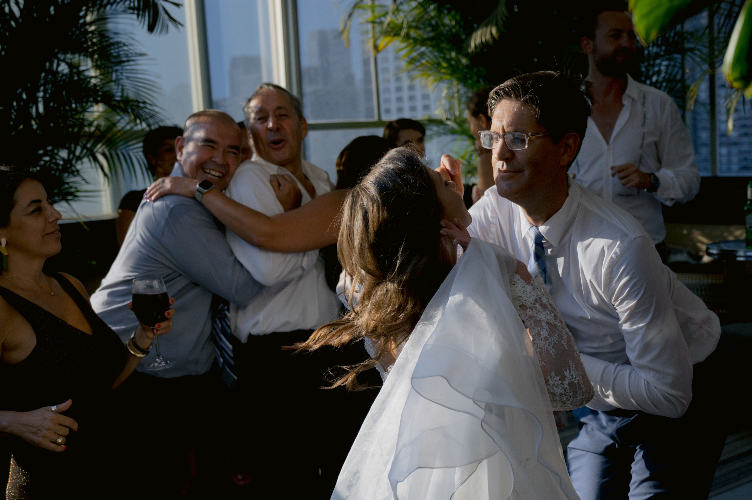 a man and woman dancing together in a room