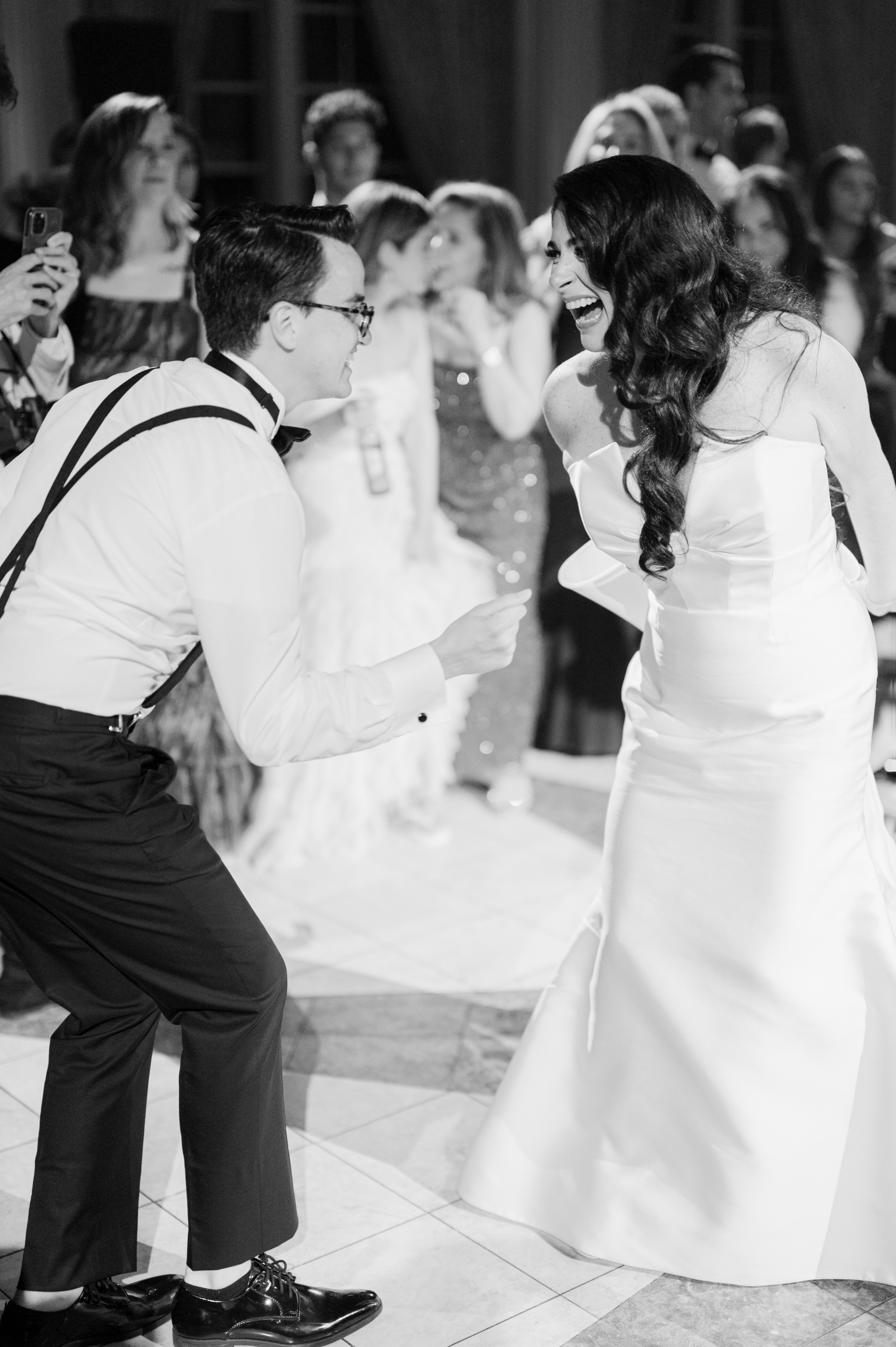 a bride and groom dancing at their wedding