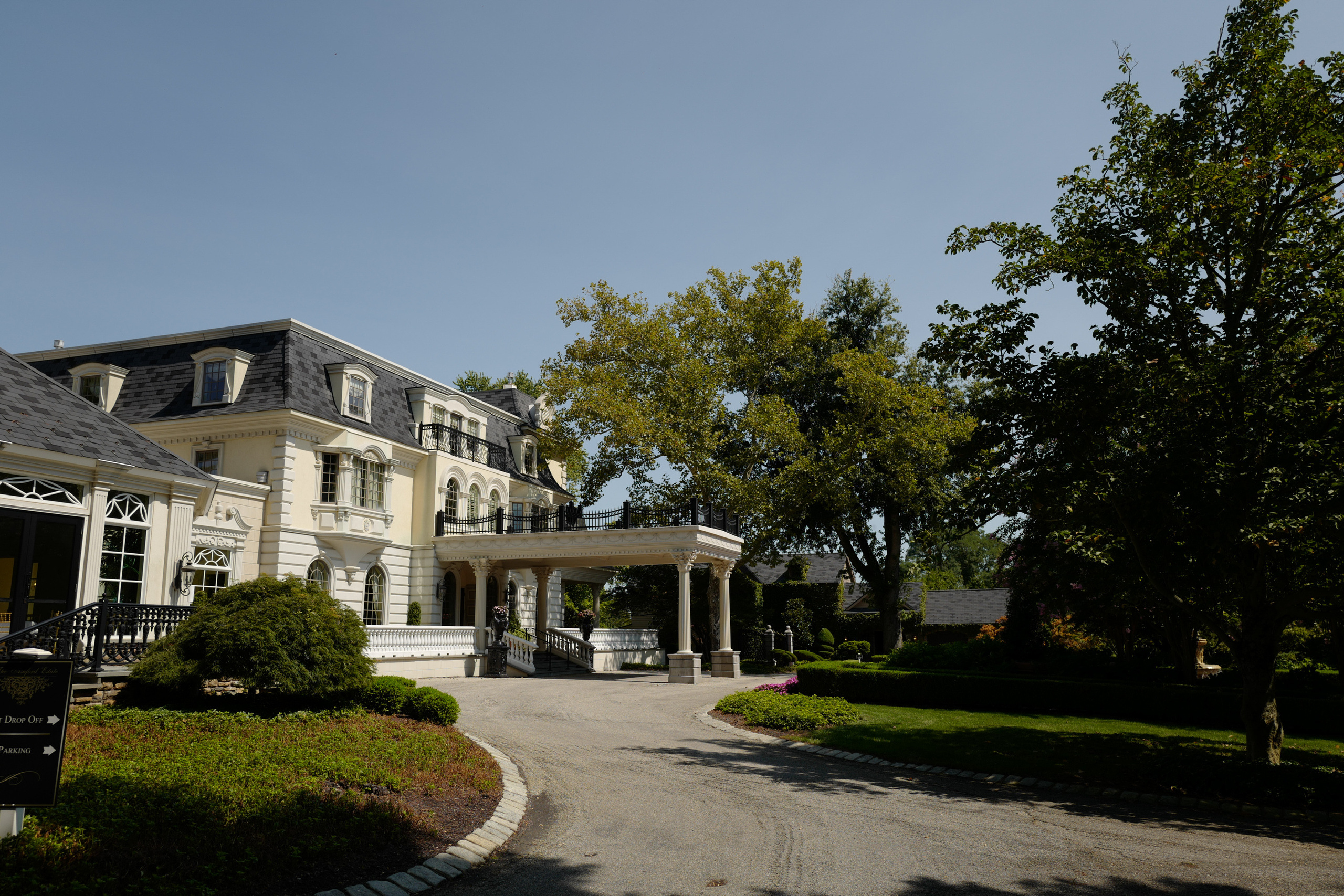 a large house with a big driveway