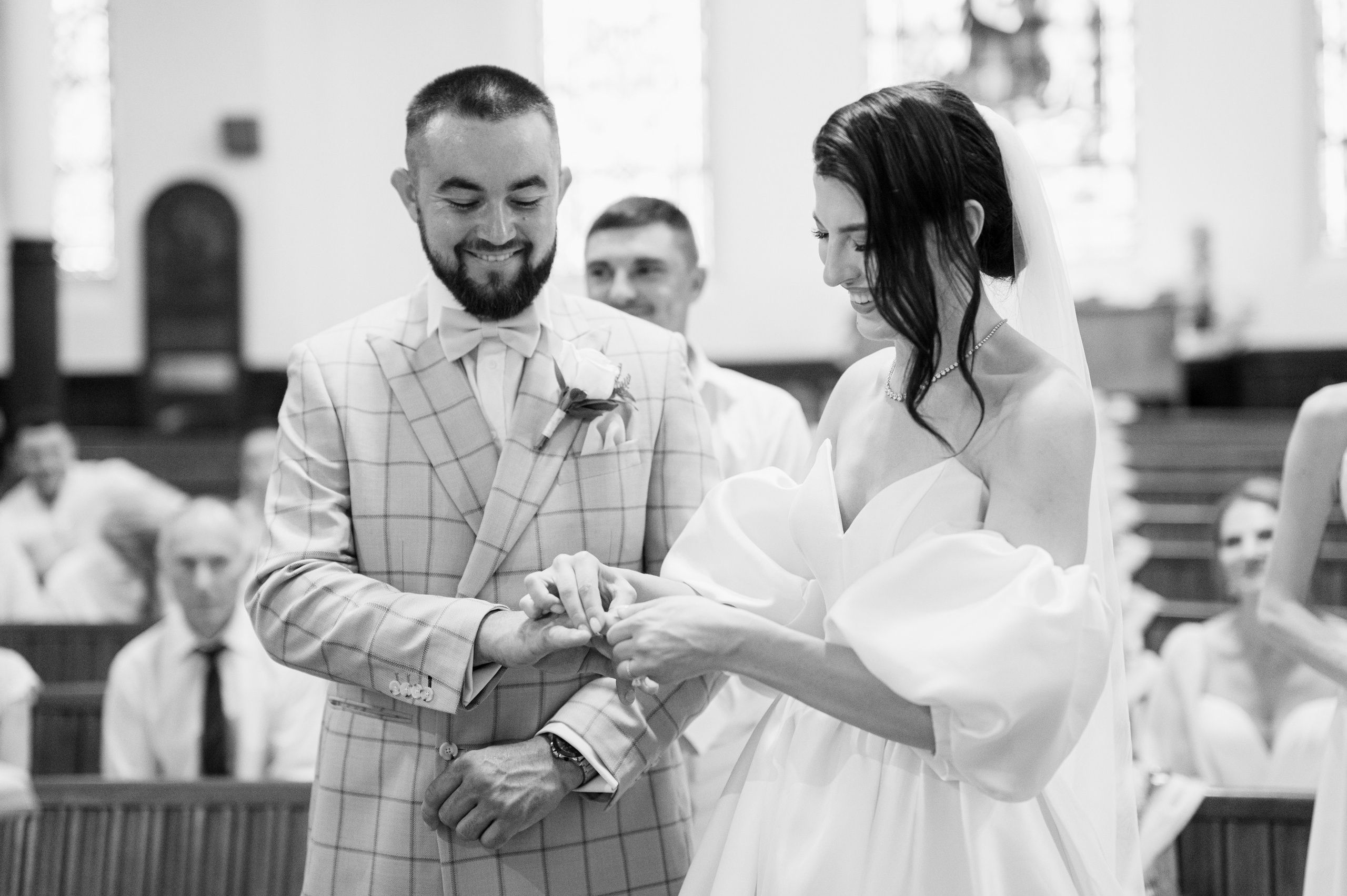 a bride and groom are exchanging during their wedding ceremony