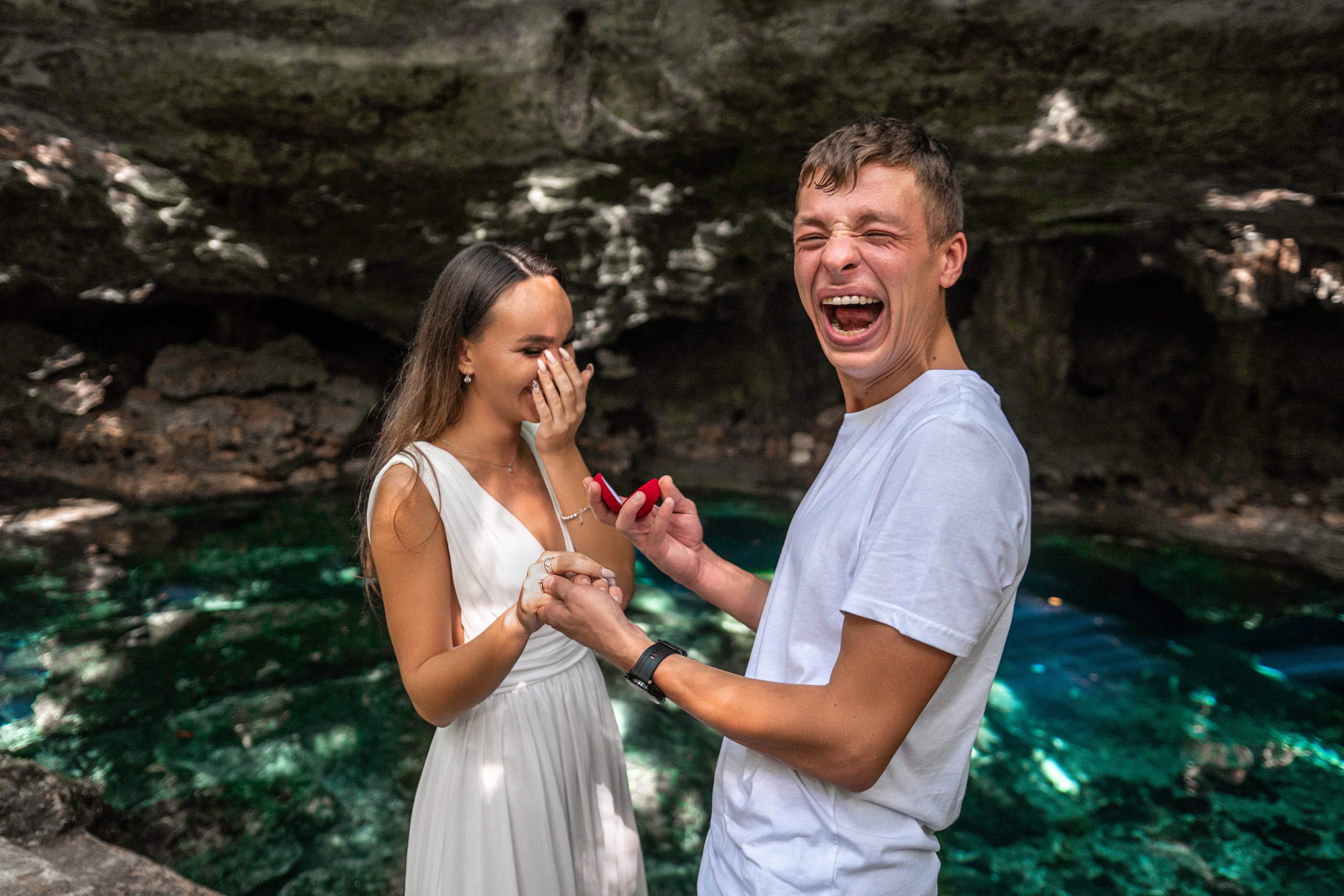 Man proposing to girlfriend in sacred Riviera Maya cenote