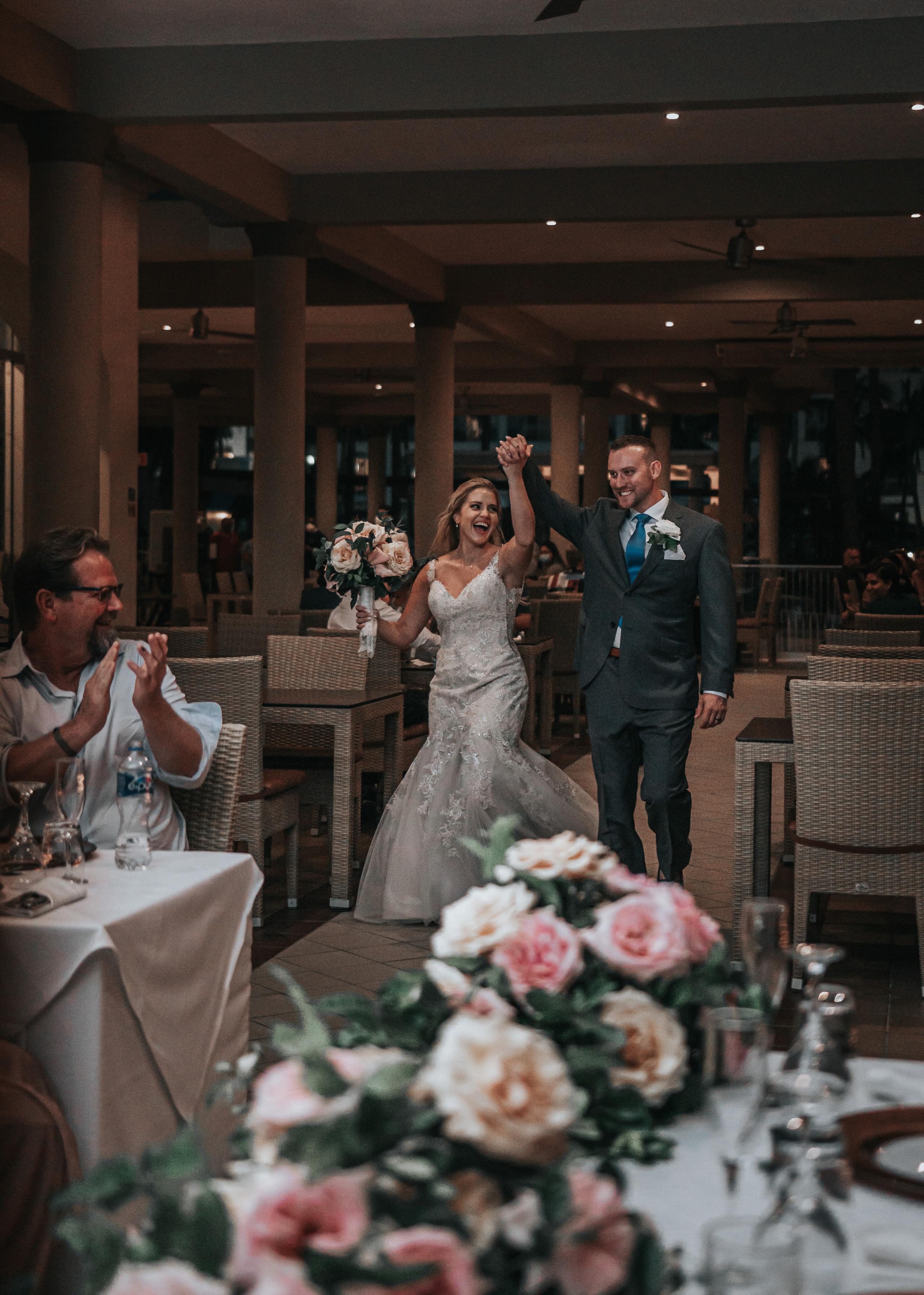 Cabo San Lucas indoor wedding celebration with floral table decor